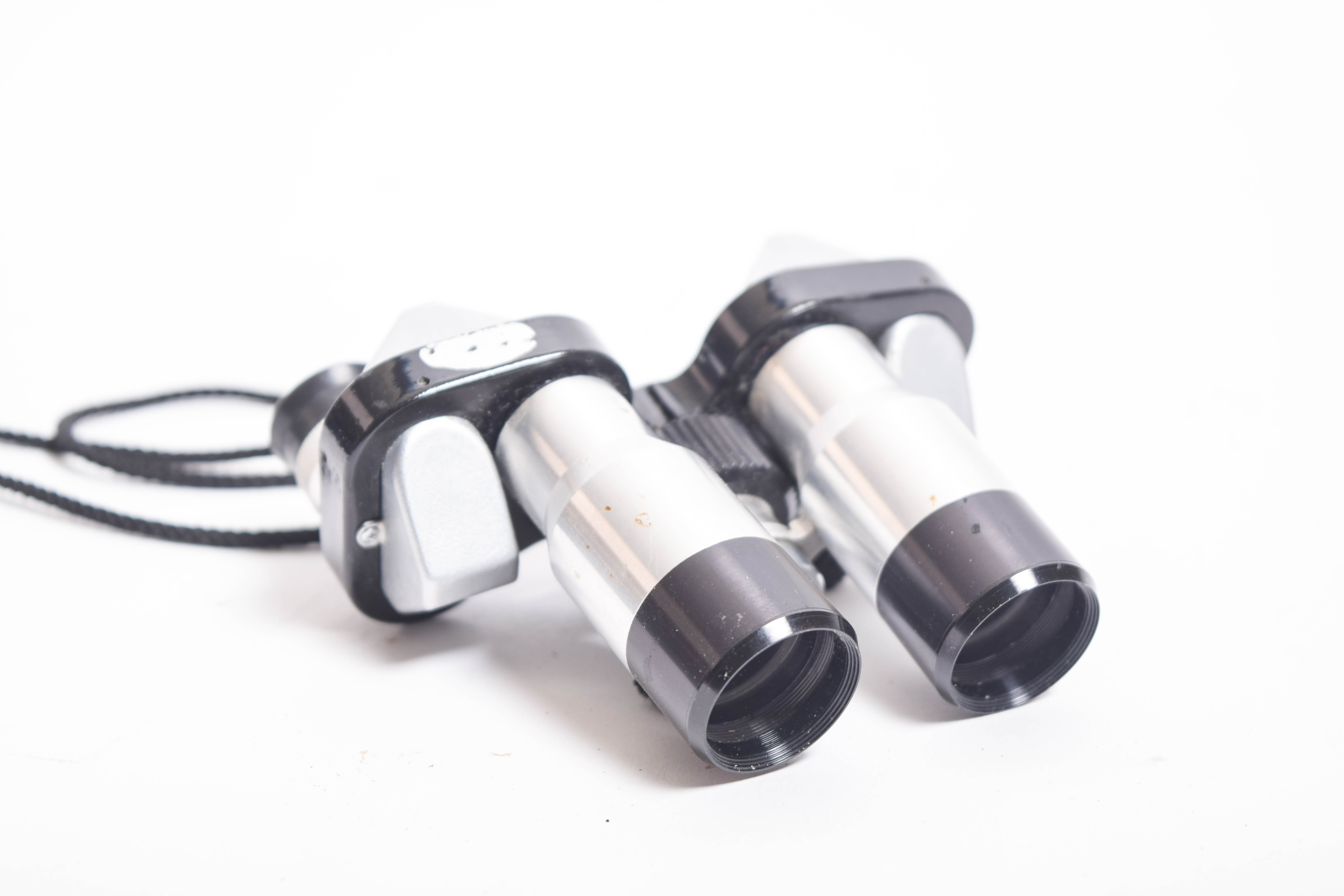 Collection of Vintage Binoculars and Tripod