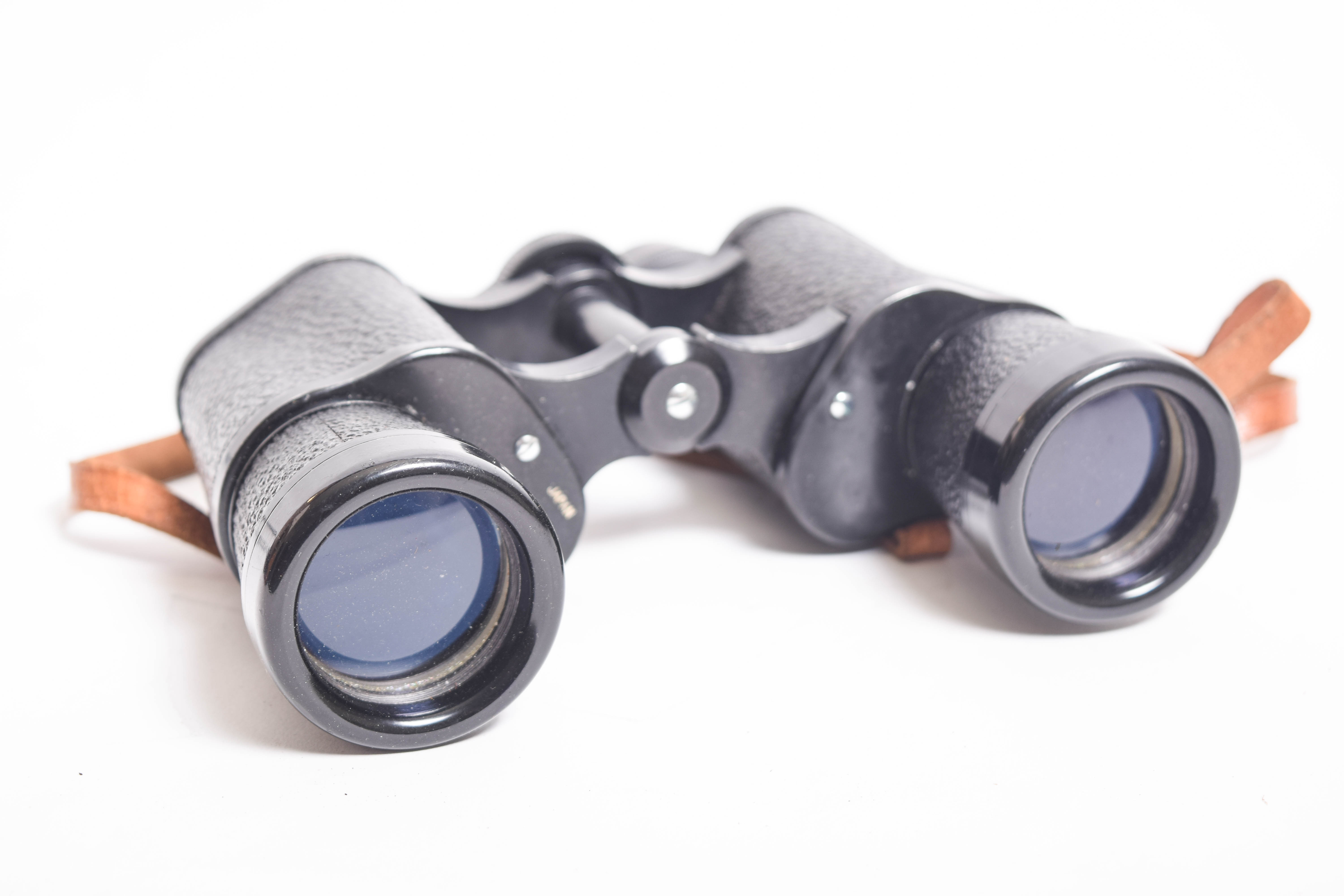 Collection of Vintage Binoculars and Tripod