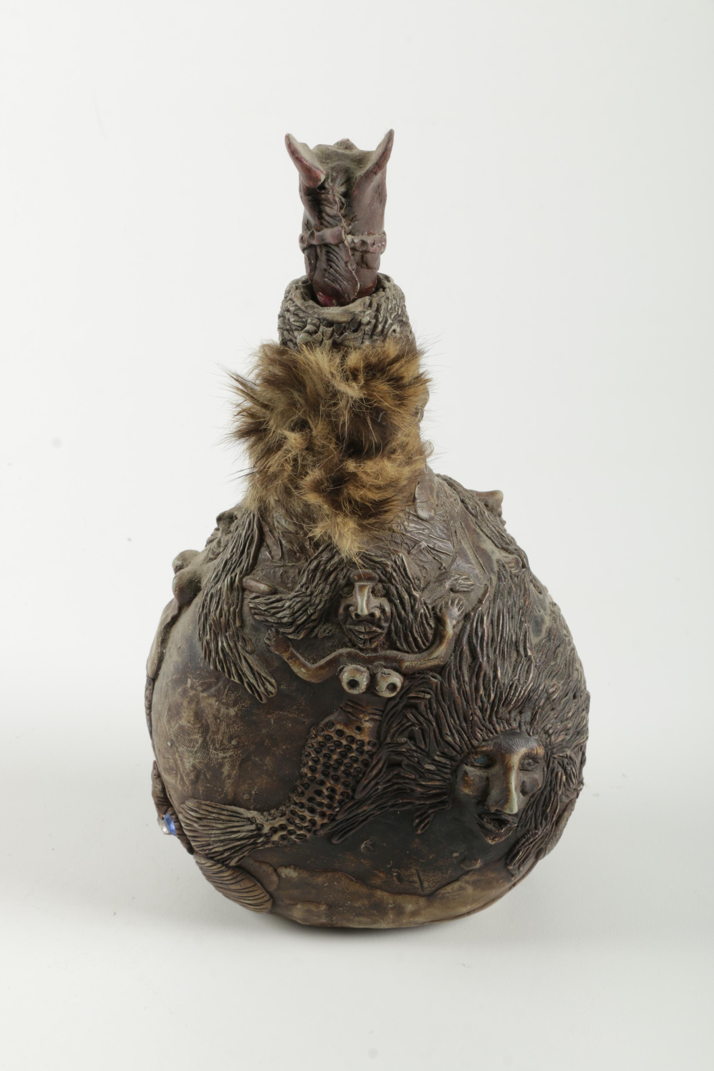 Ceramic Decanter with Mermaids, Flowers, and Faces in Low Relief