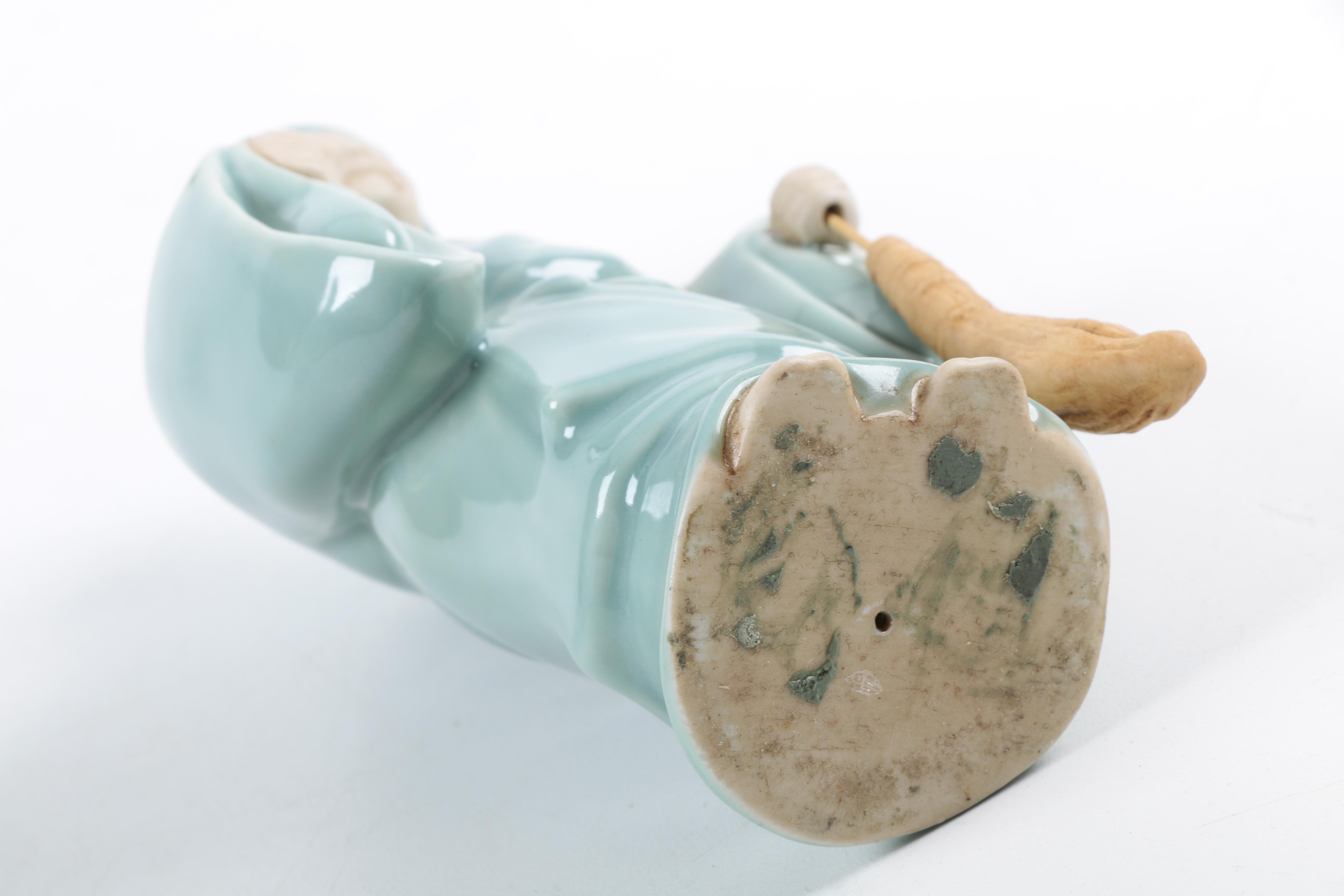 Pair of East Asian Ceramic Figurines