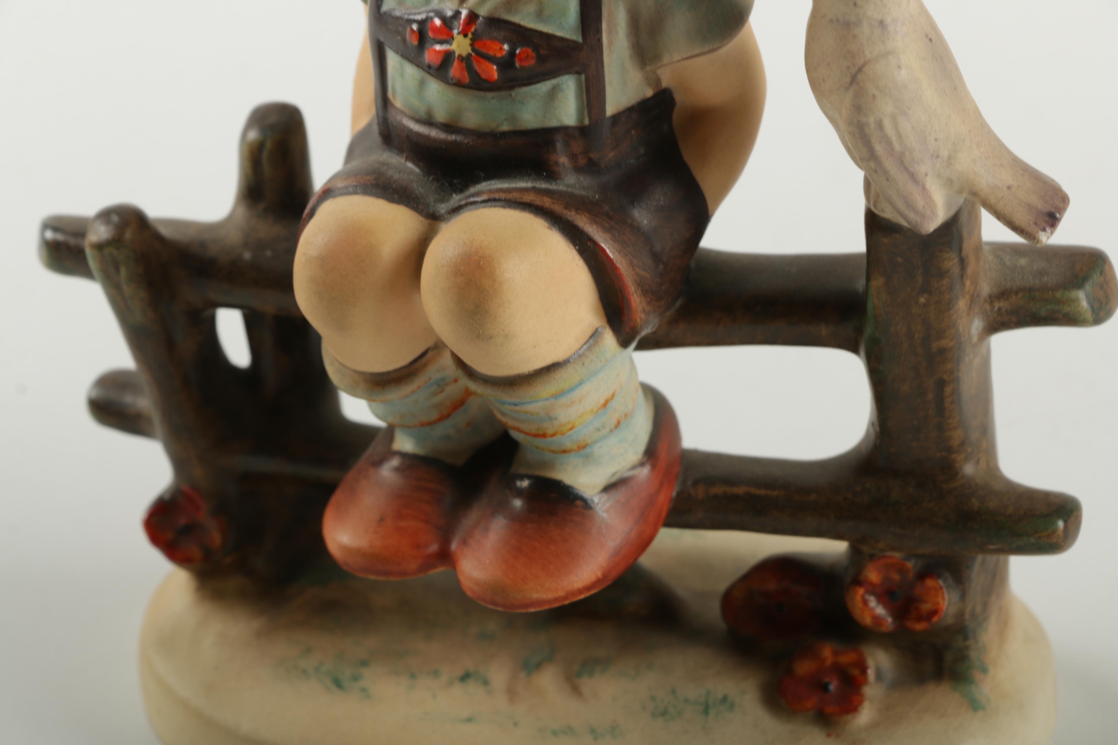 Hummel Boy Sitting On Fence Figurine