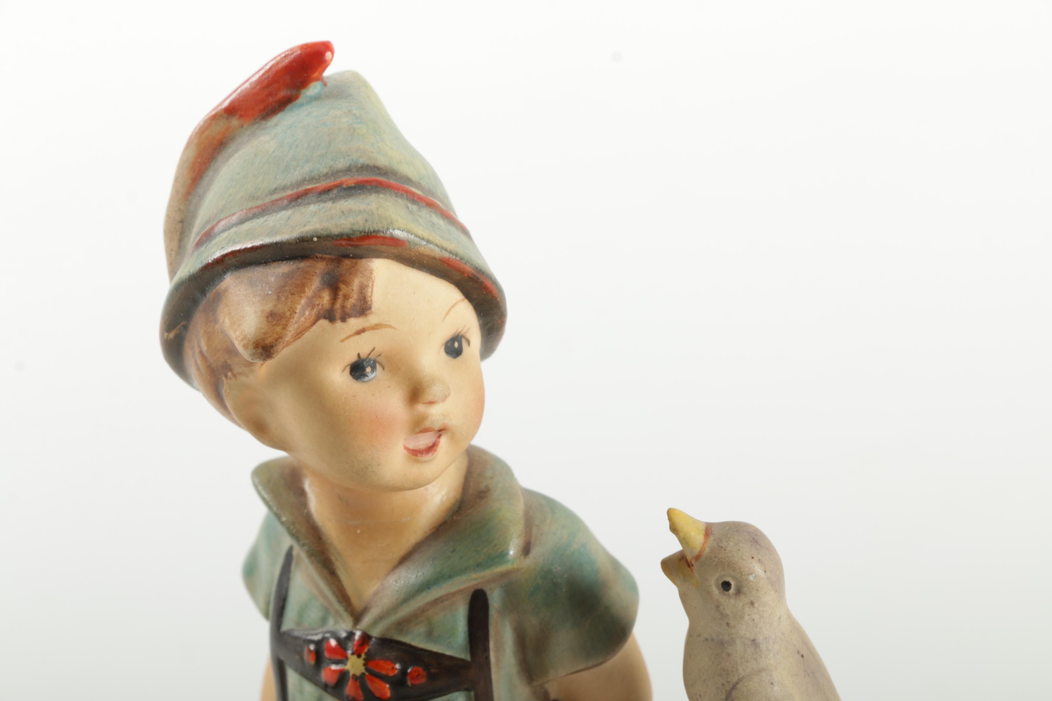 Hummel Boy Sitting On Fence Figurine