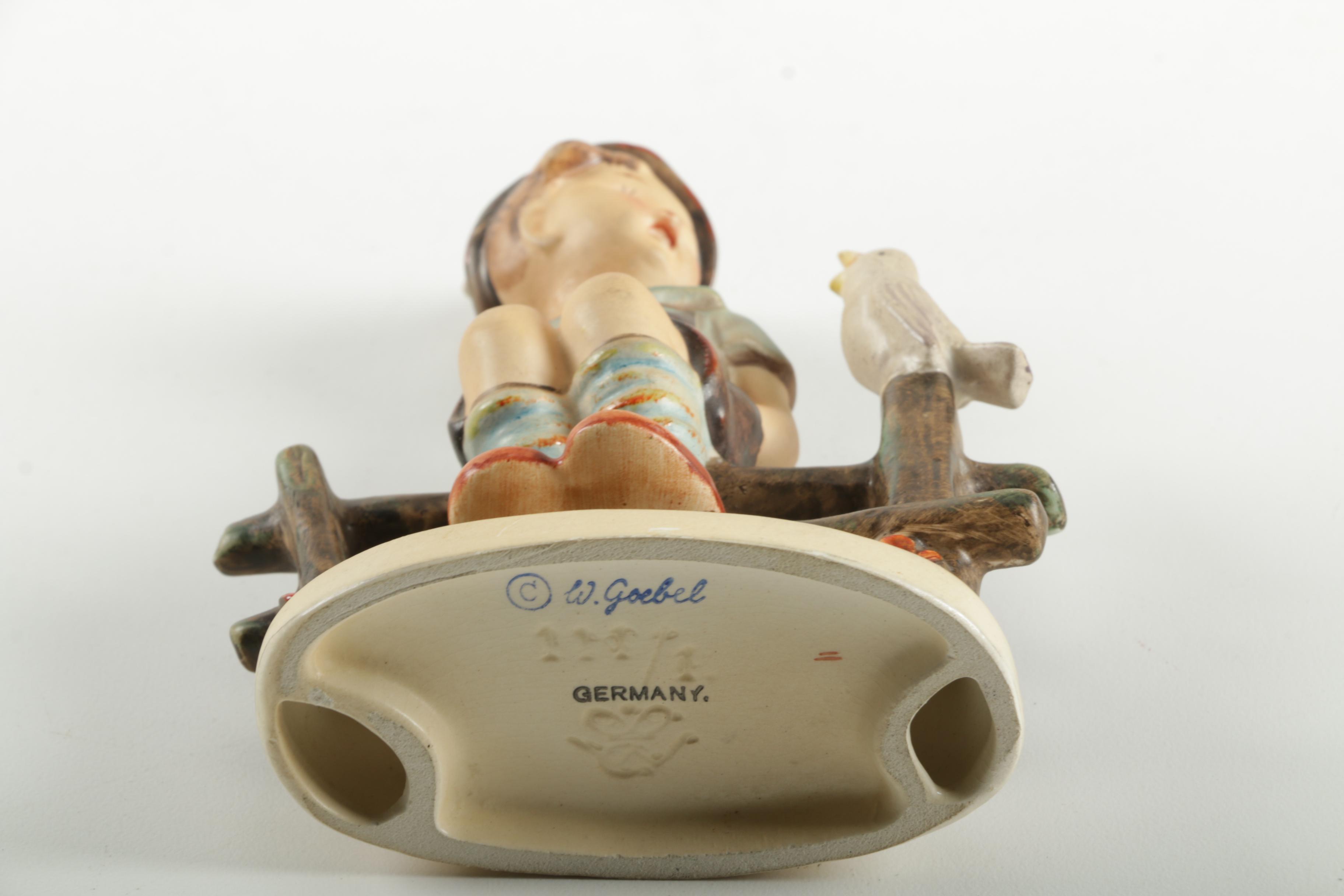 Hummel Boy Sitting On Fence Figurine