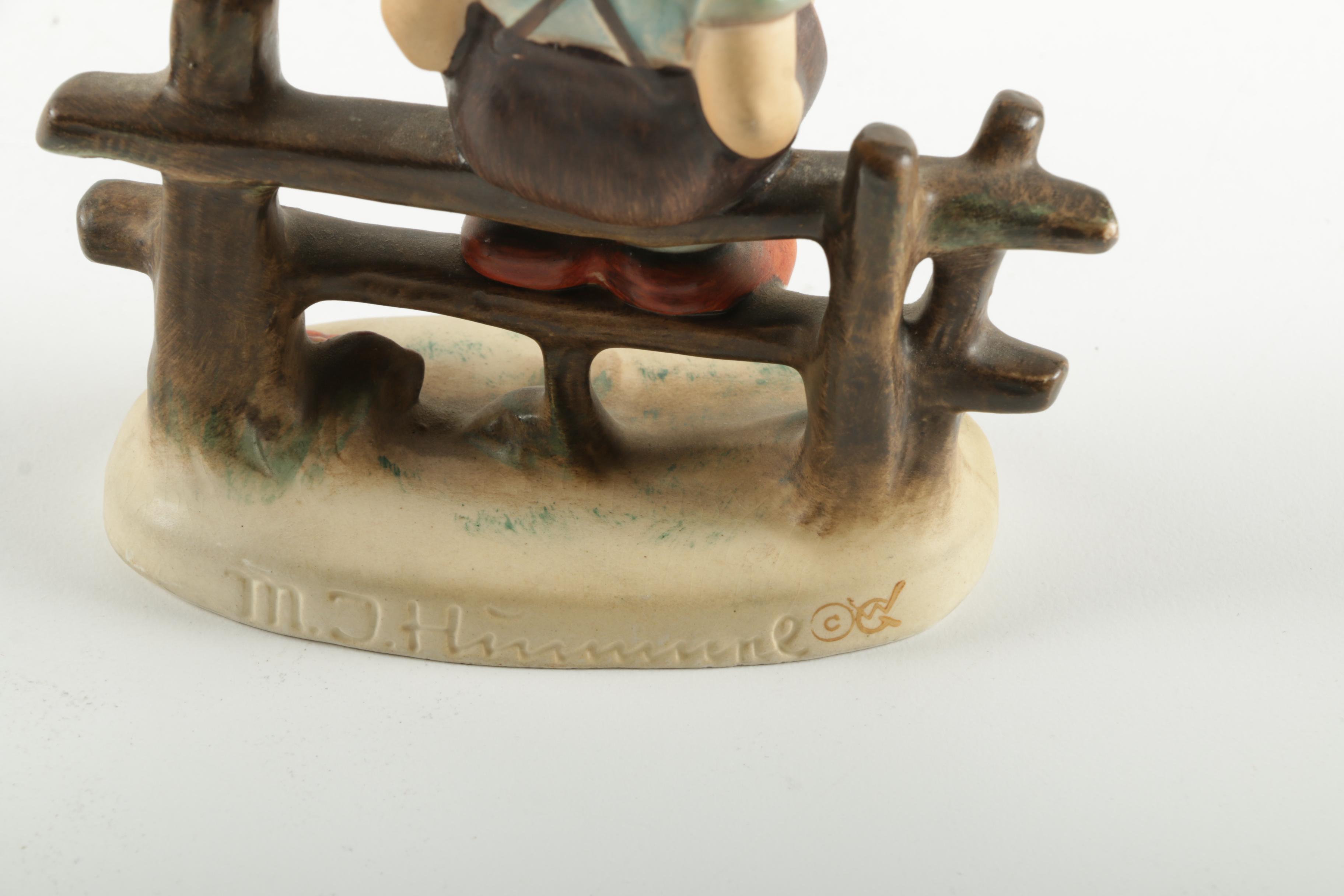 Hummel Boy Sitting On Fence Figurine
