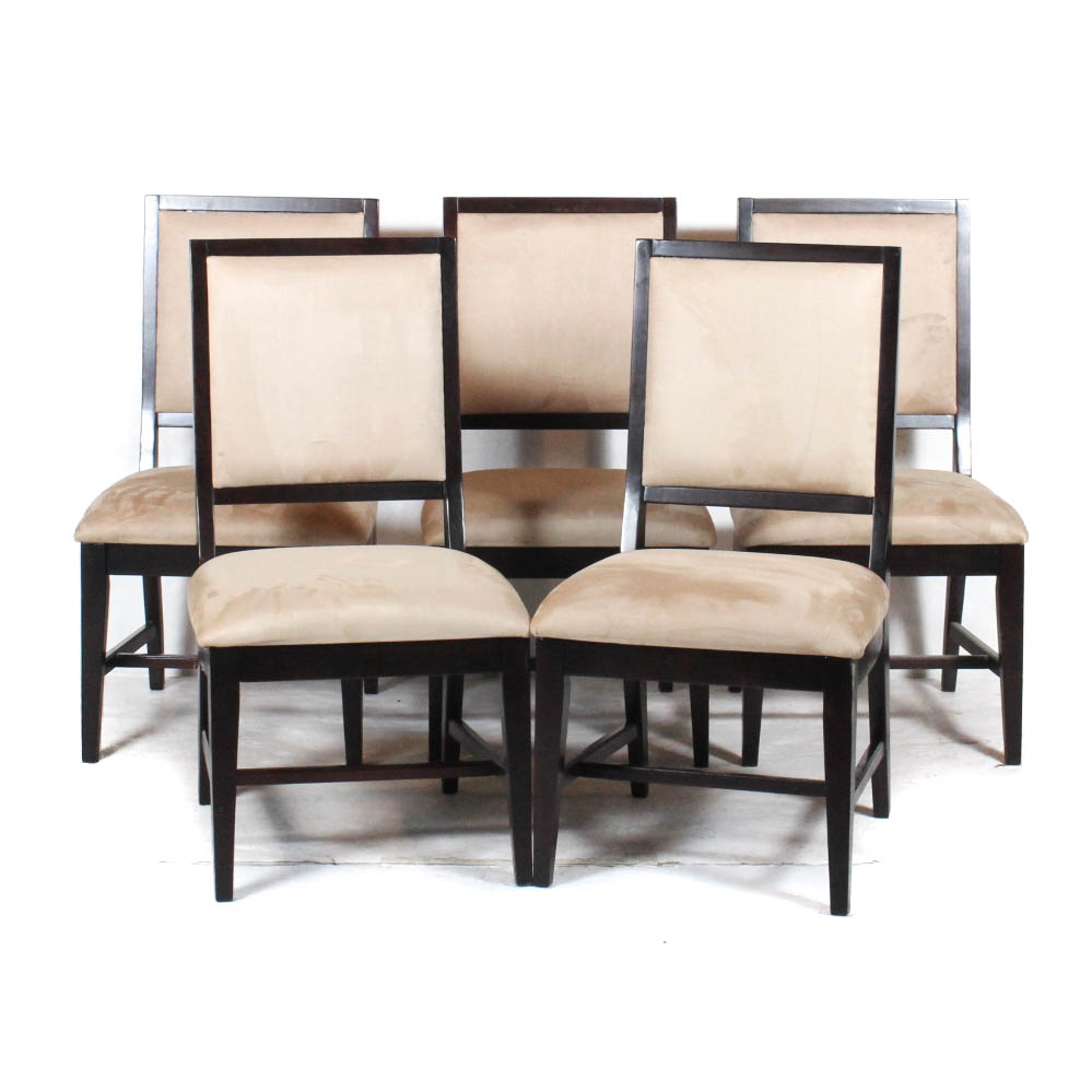 Four Traditional Wood Framed Dining Chairs by Ashley Furniture