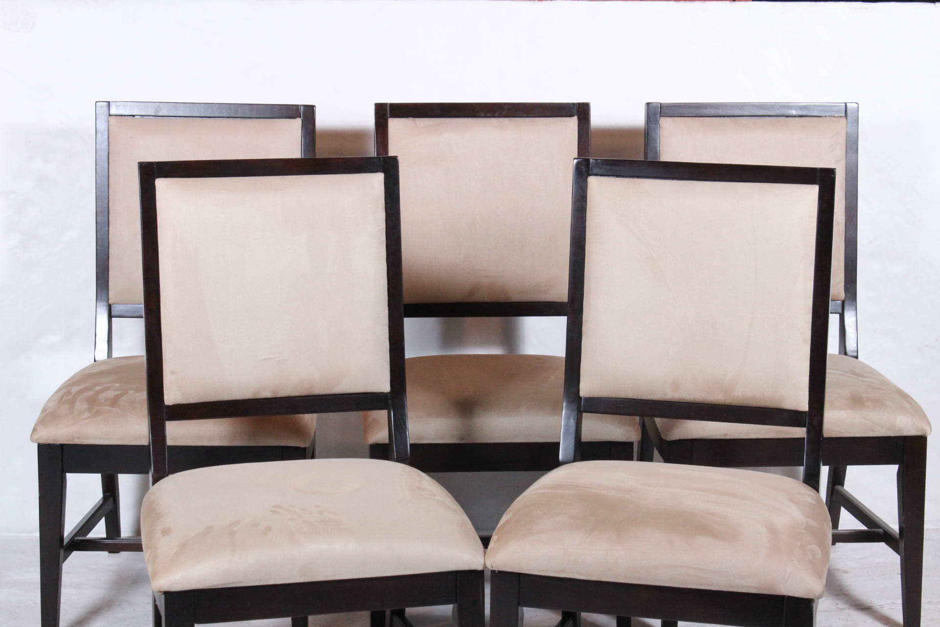 Four Traditional Wood Framed Dining Chairs by Ashley Furniture