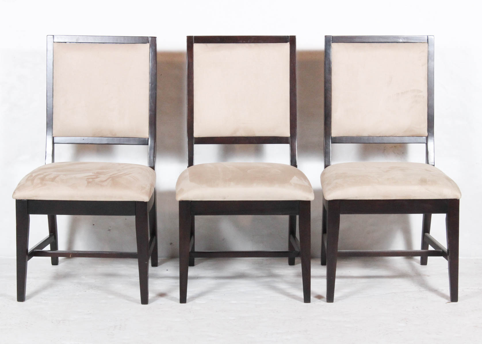 Four Traditional Wood Framed Dining Chairs by Ashley Furniture