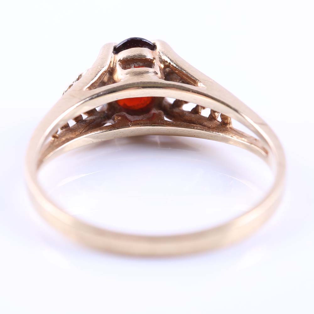 10K Yellow Gold Garnet and Cubic Zirconia Ring