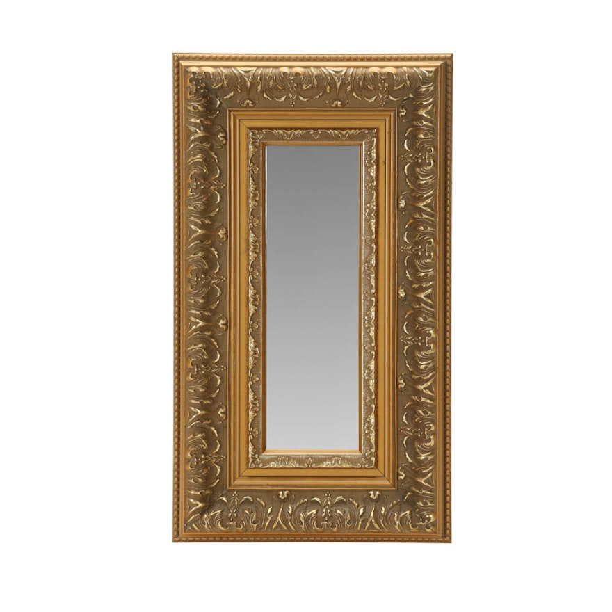 Gold Tone Mirror with Decorative Frame