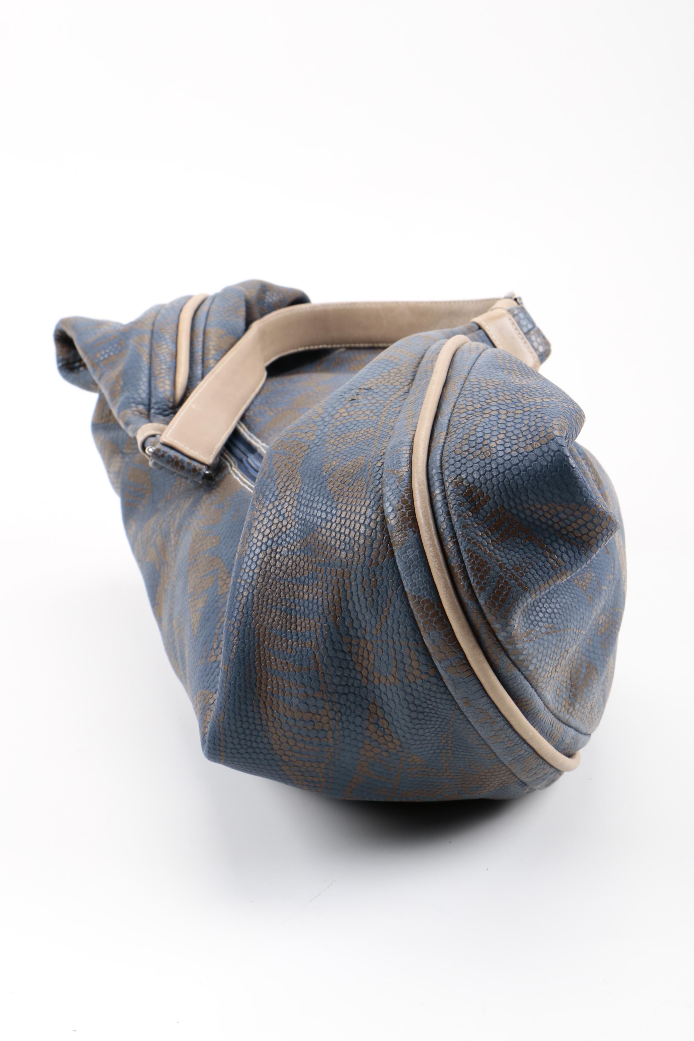 Gucci Embossed Leather Hobo Sling Bag