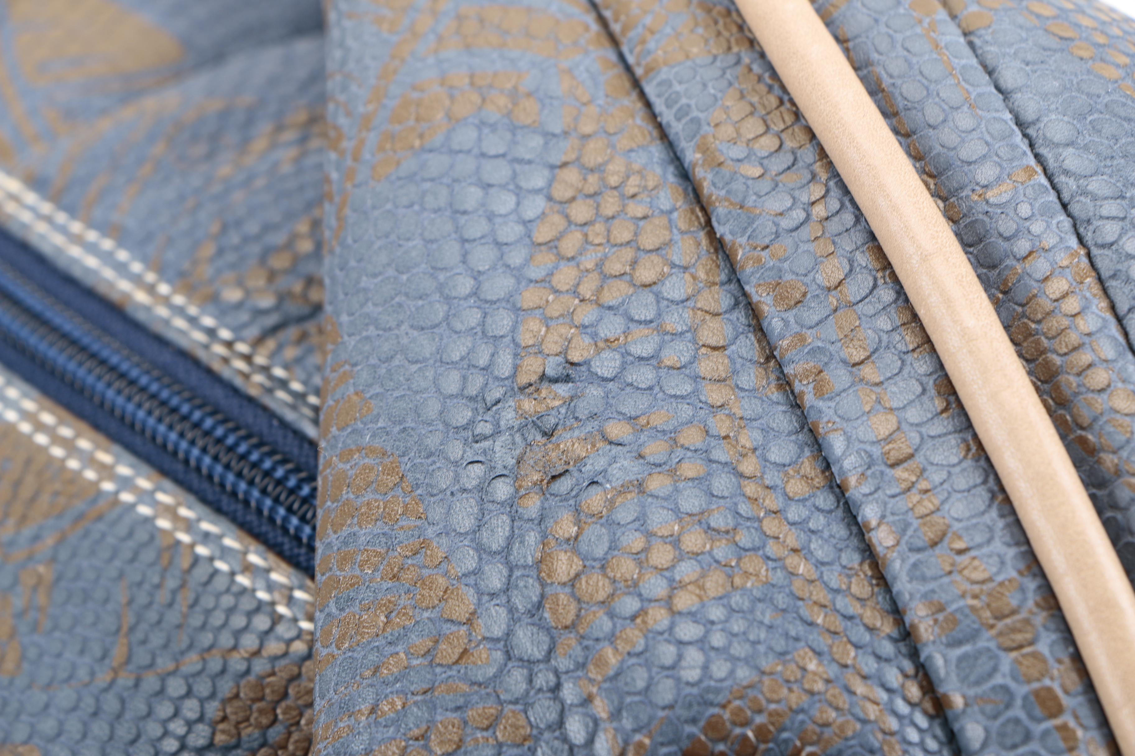 Gucci Embossed Leather Hobo Sling Bag