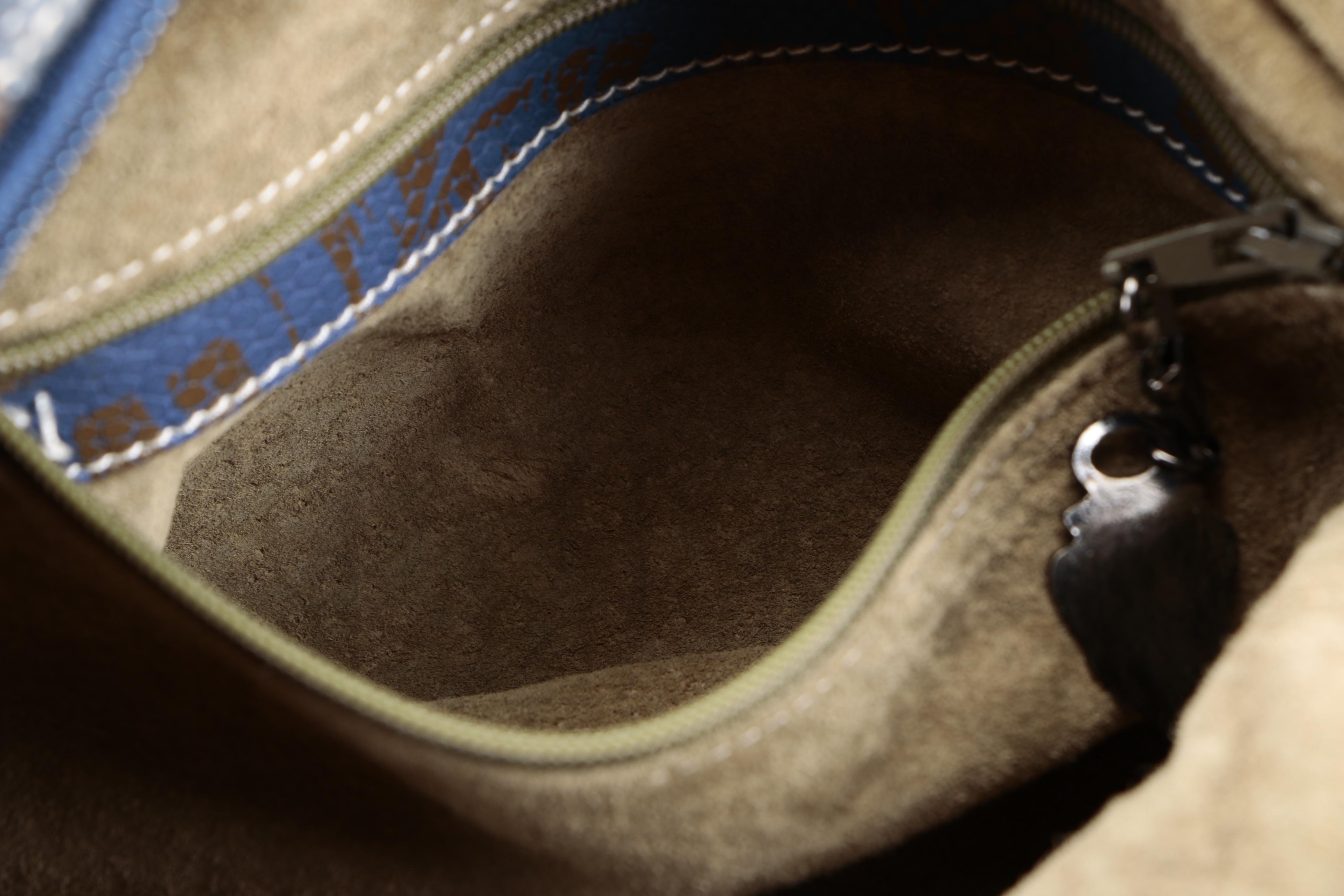 Gucci Embossed Leather Hobo Sling Bag