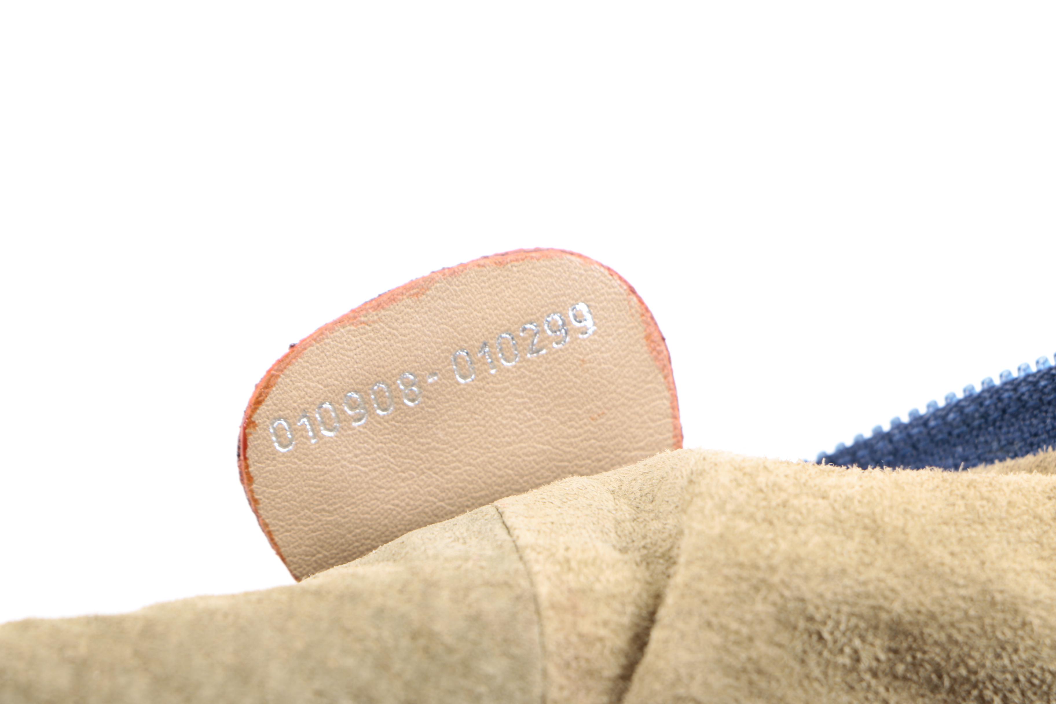 Gucci Embossed Leather Hobo Sling Bag