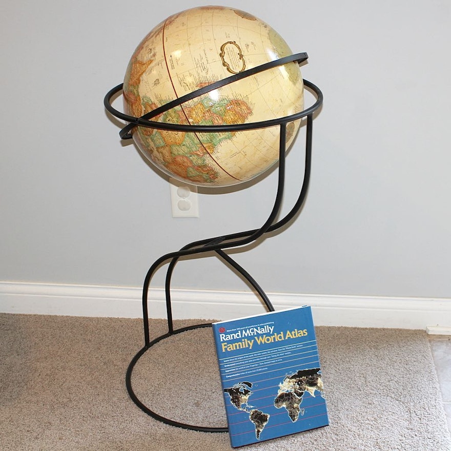 Globe on Iron Floor Stand with a "Family World Atlas"