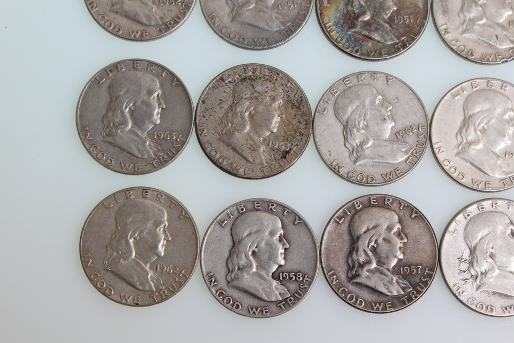 Fourteen Franklin Half Dollars