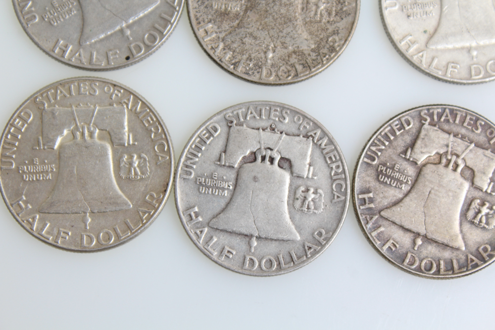 Fourteen Franklin Half Dollars