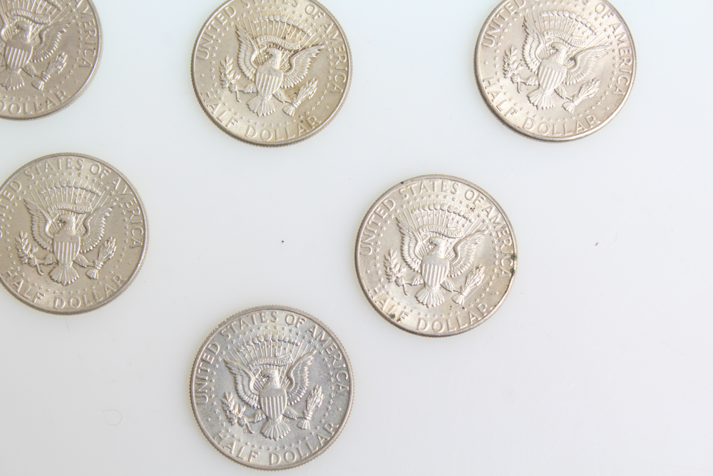 Sixteen 1964 Kennedy Half Dollars