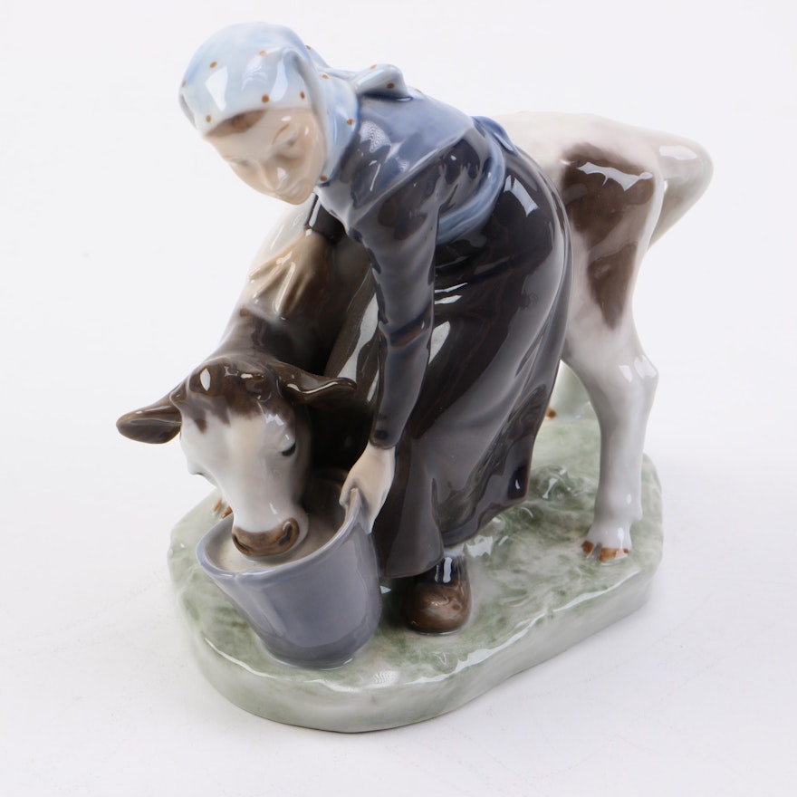 Royal Copenhagen Girl Feeding Calf Figurine
