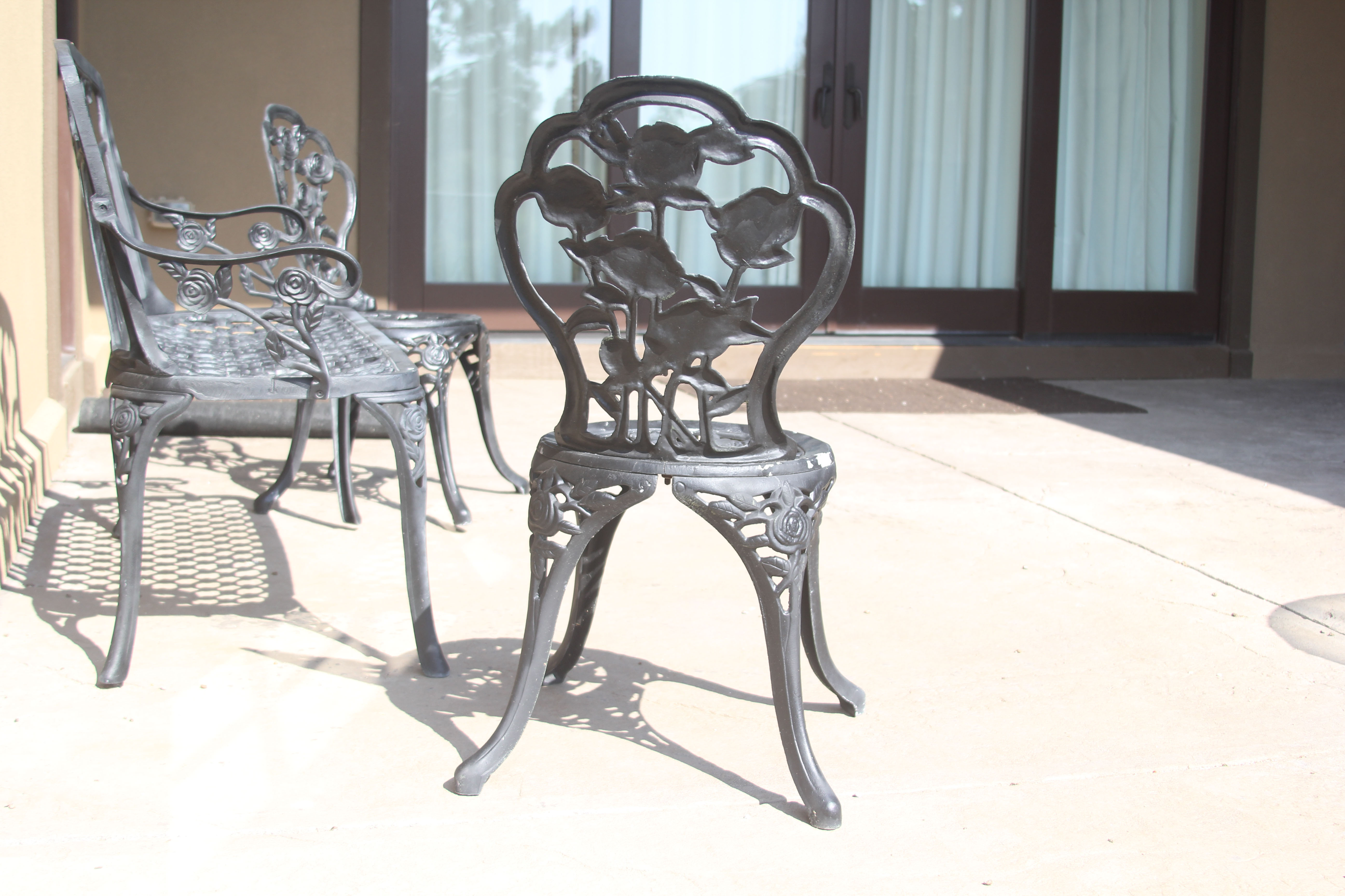 Black Painted Metal Rose Trellis Themed Patio Bench and Chairs