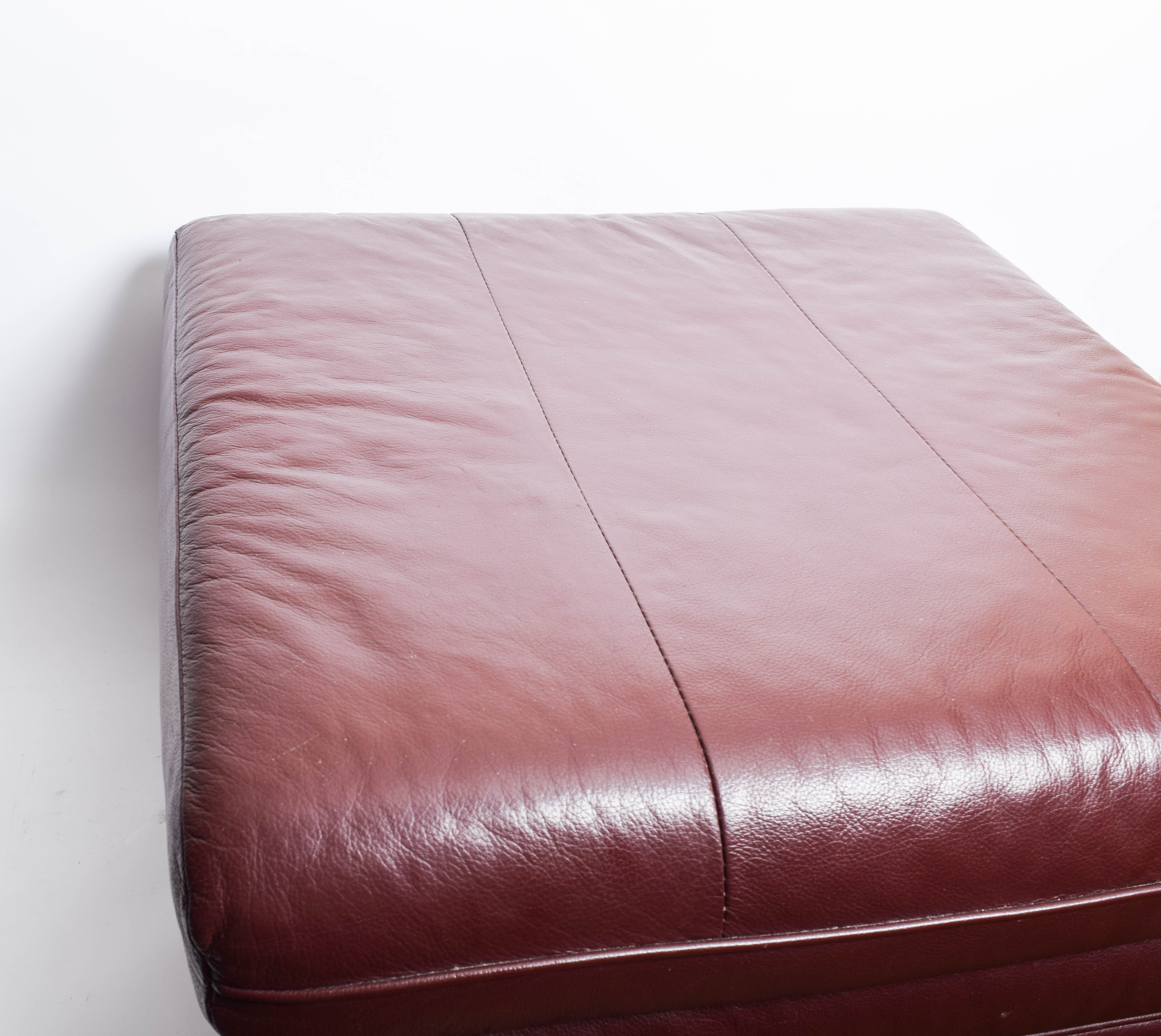 Red Faux Leather Ottoman on Wheels