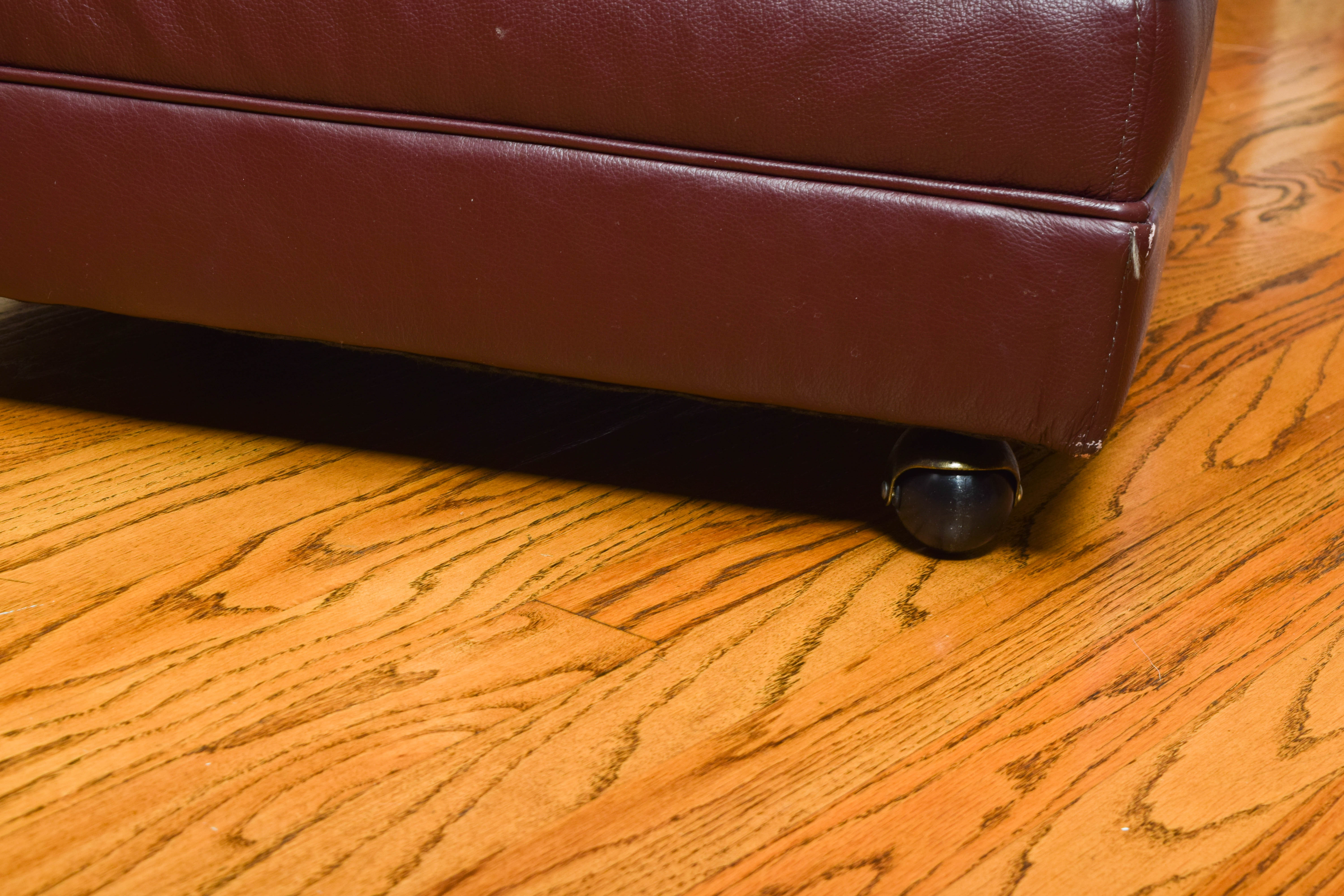 Red Faux Leather Ottoman on Wheels