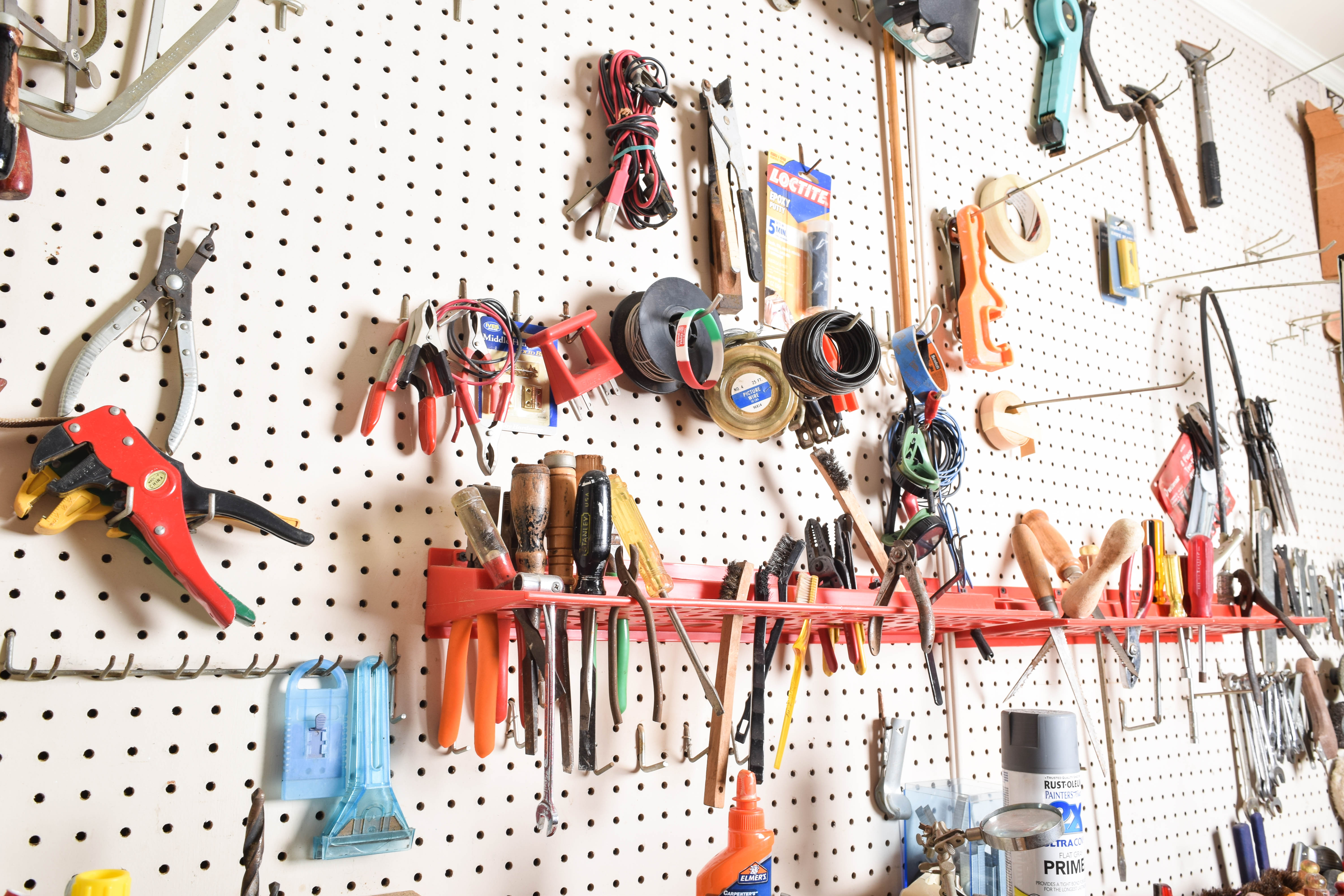 Work Bench and Wall of Assorted Tools