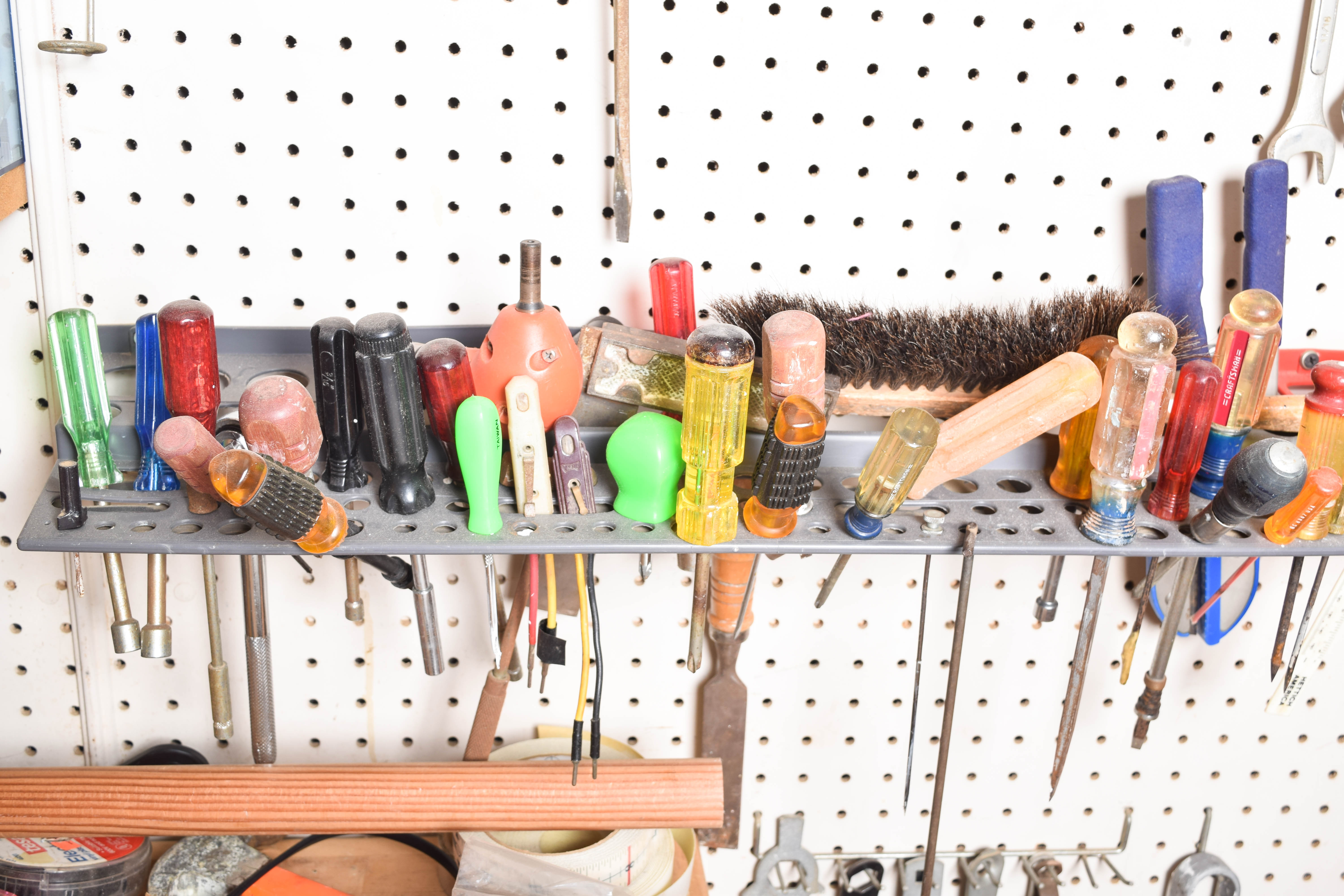 Work Bench and Wall of Assorted Tools