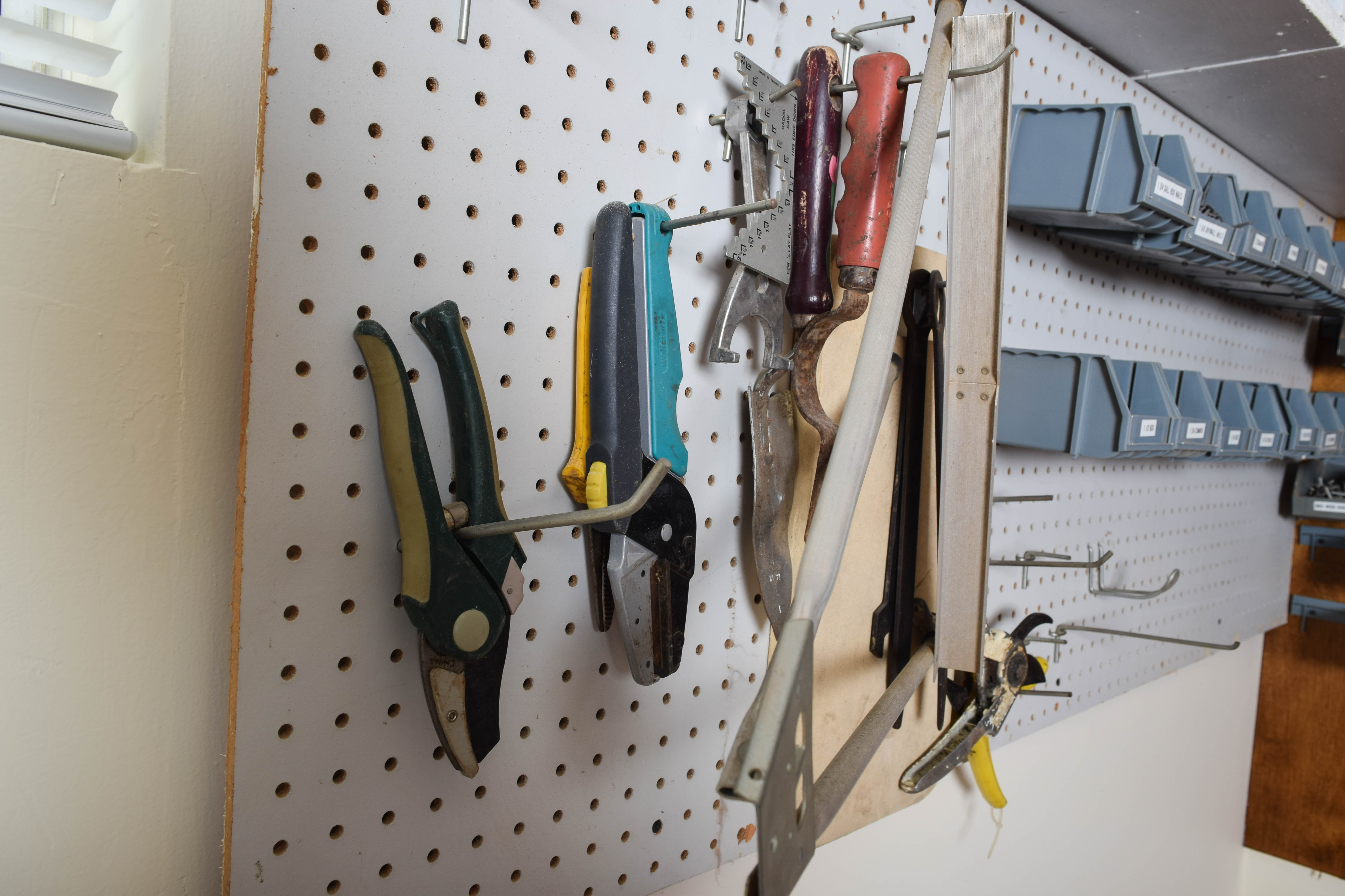 Work Bench and Wall of Assorted Tools