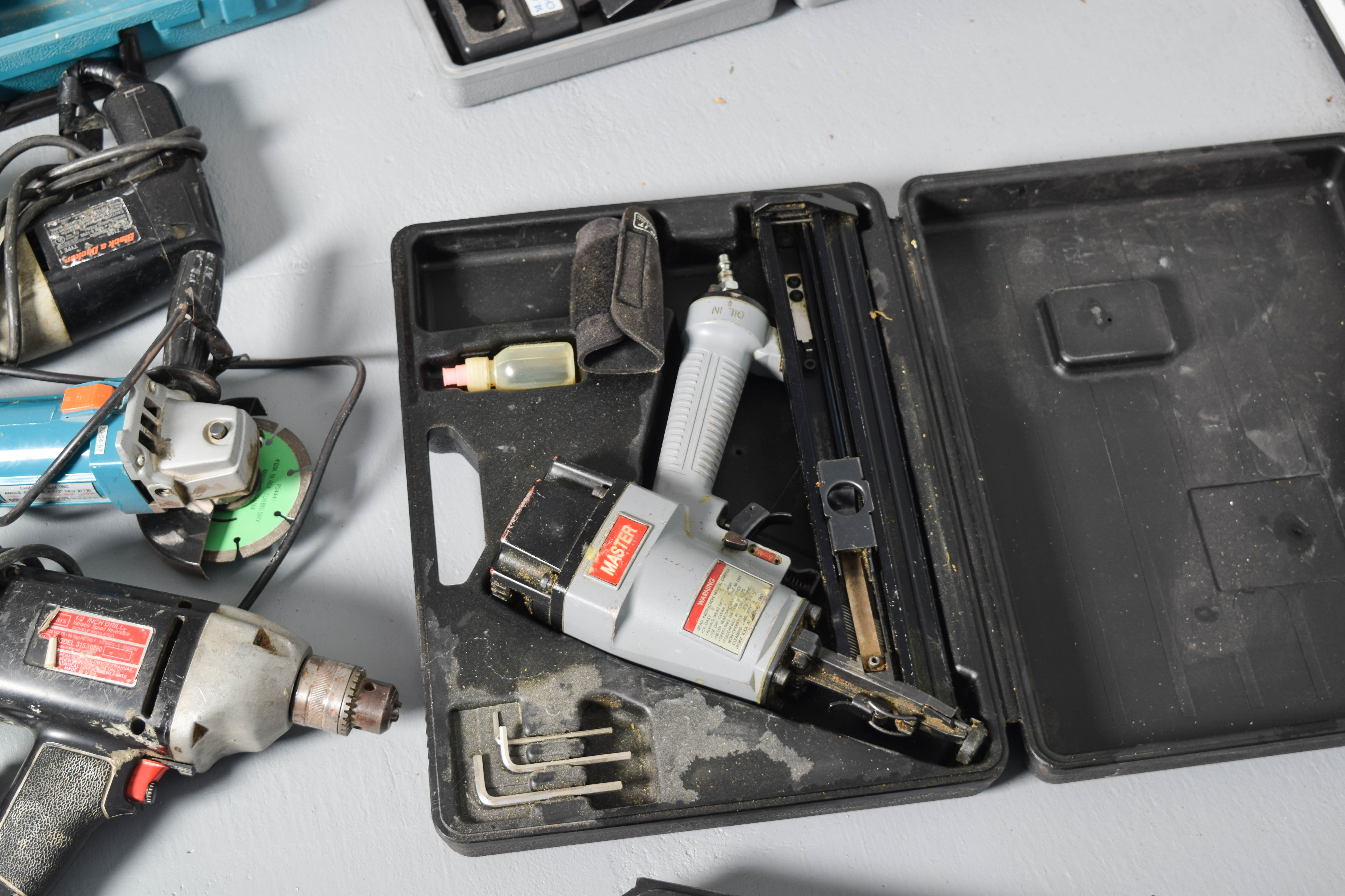 Collection of Drills, Skilsaws, and Other Power Tools