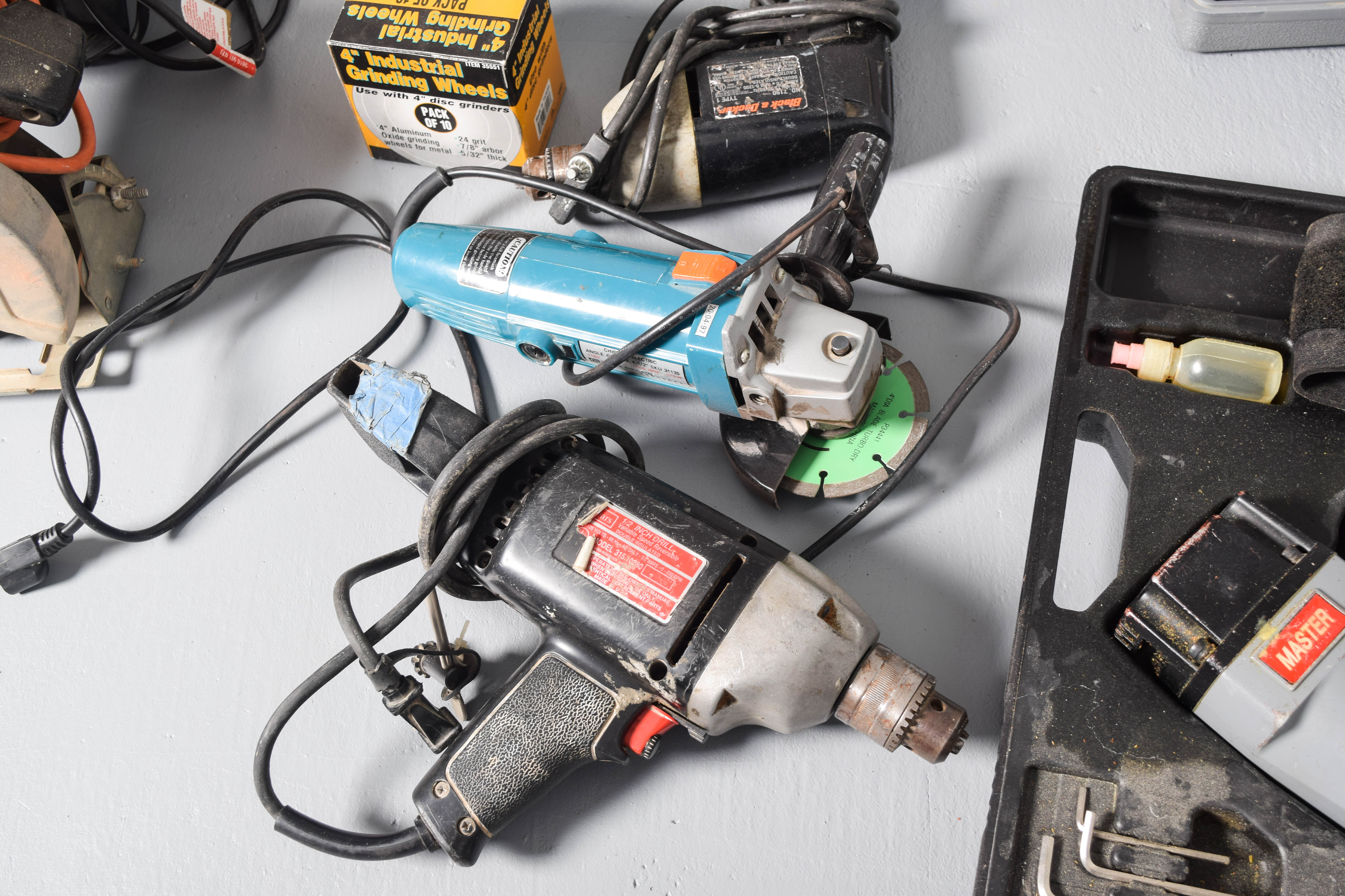 Collection of Drills, Skilsaws, and Other Power Tools