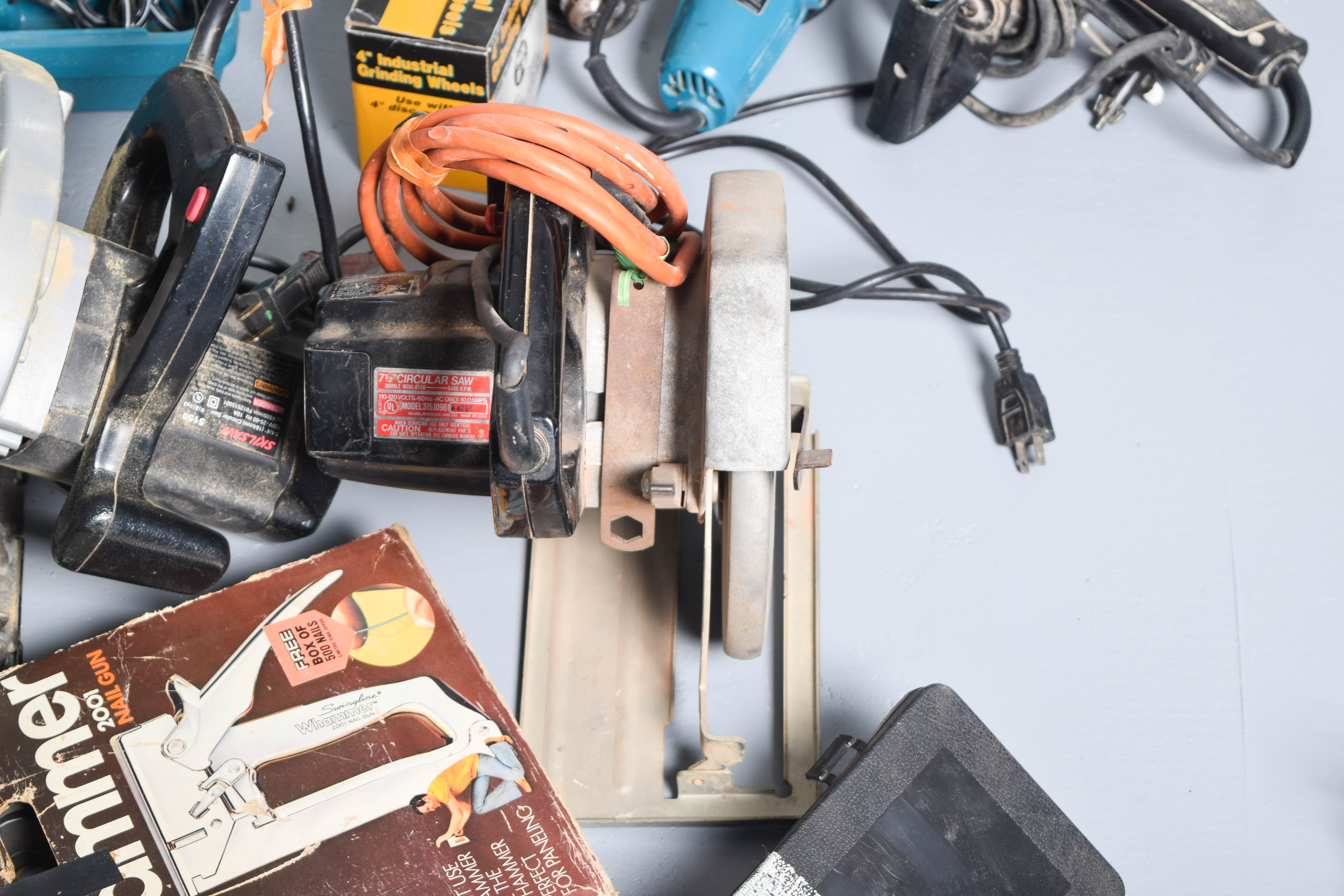 Collection of Drills, Skilsaws, and Other Power Tools