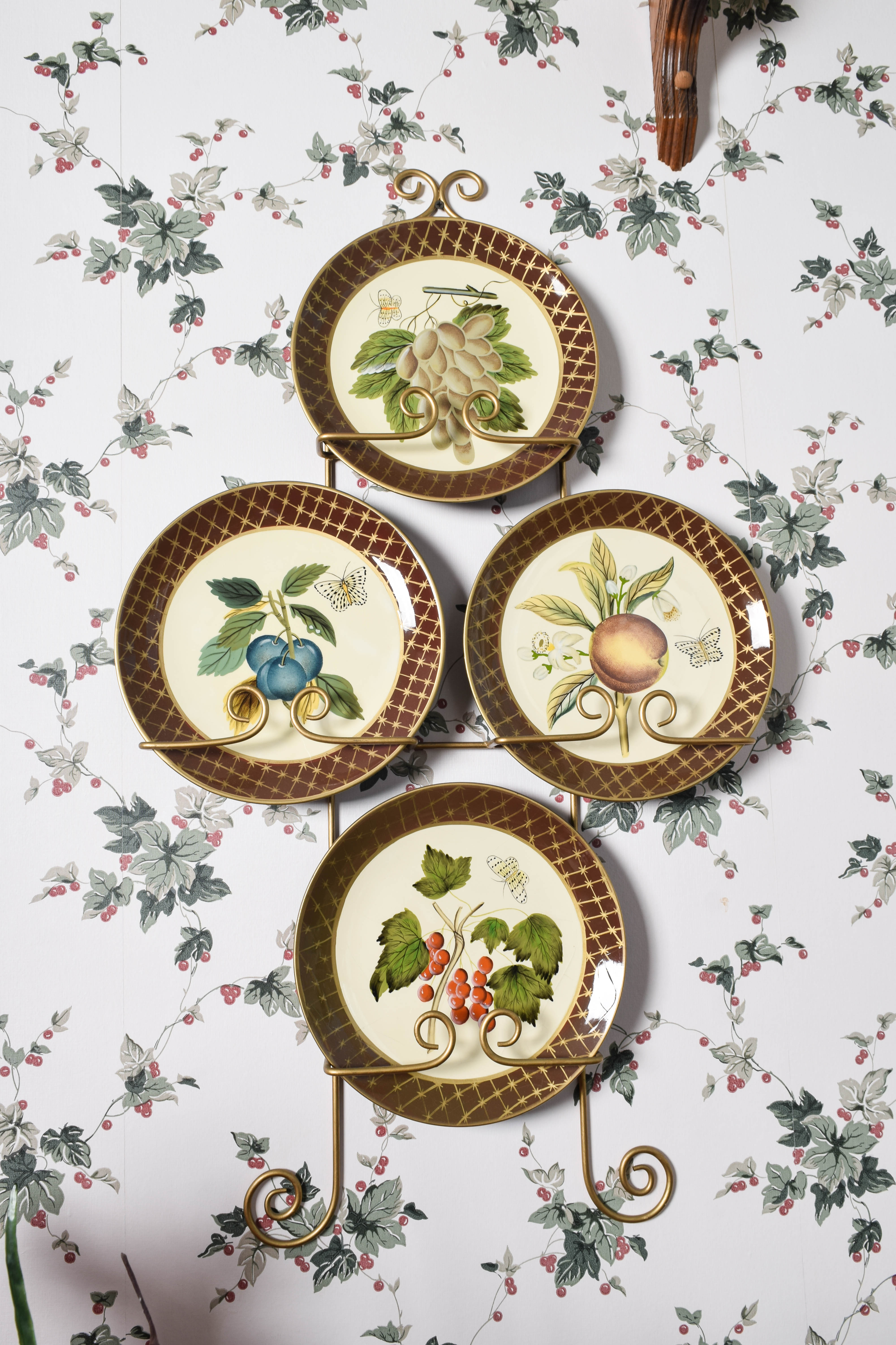 Collection of Raymond Waites Decorative Ceramic Plates and Wall Stands