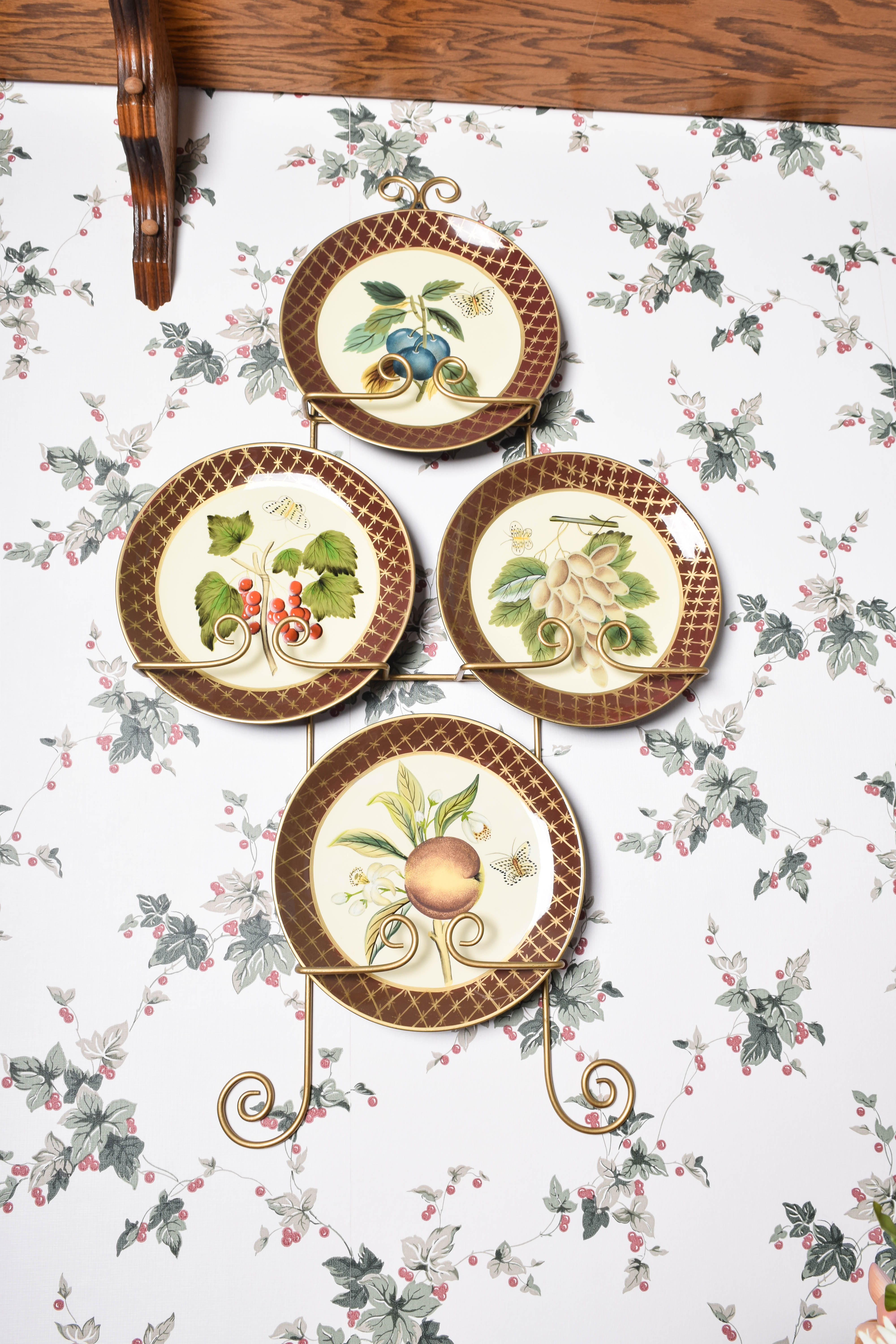 Collection of Raymond Waites Decorative Ceramic Plates and Wall Stands