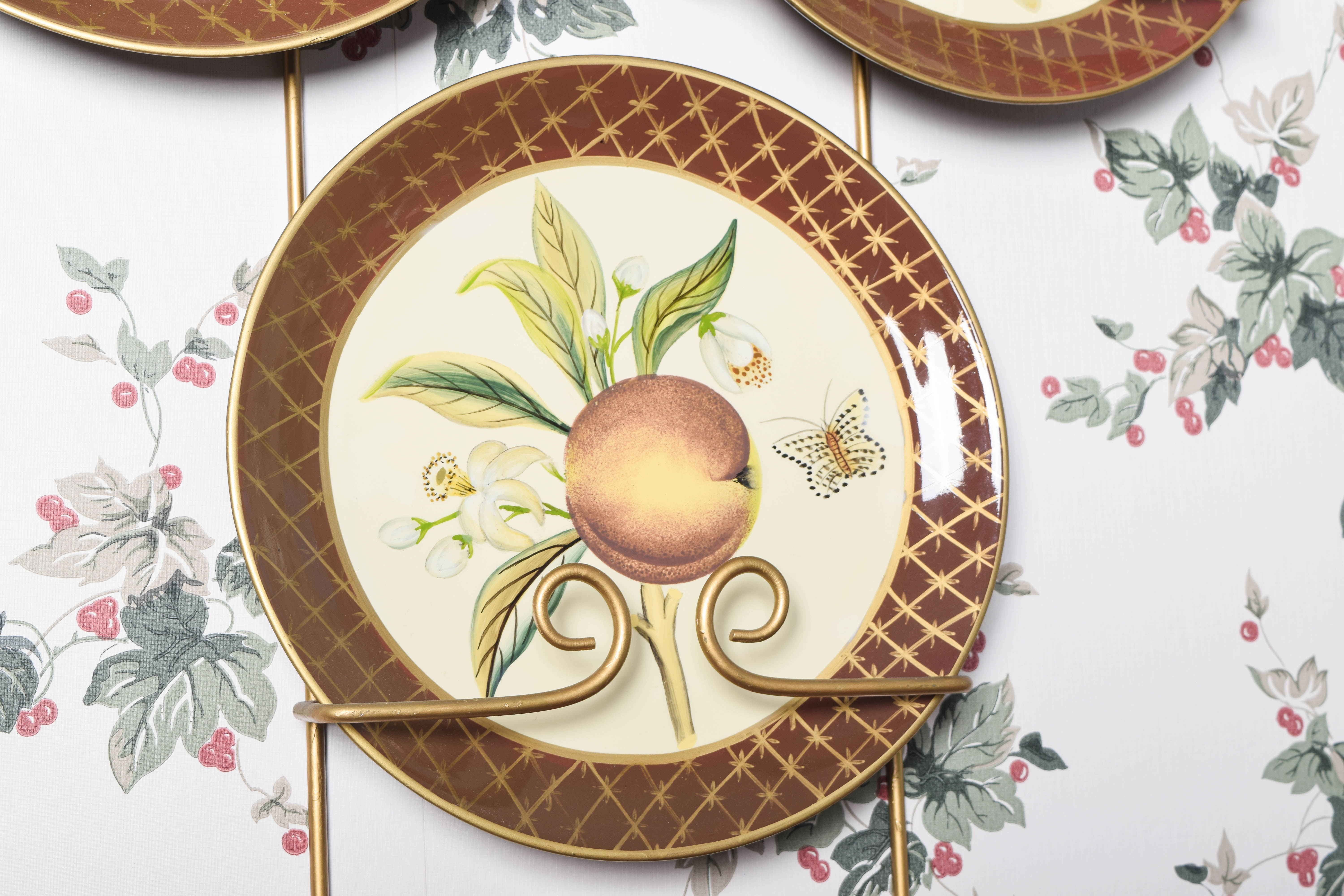 Collection of Raymond Waites Decorative Ceramic Plates and Wall Stands