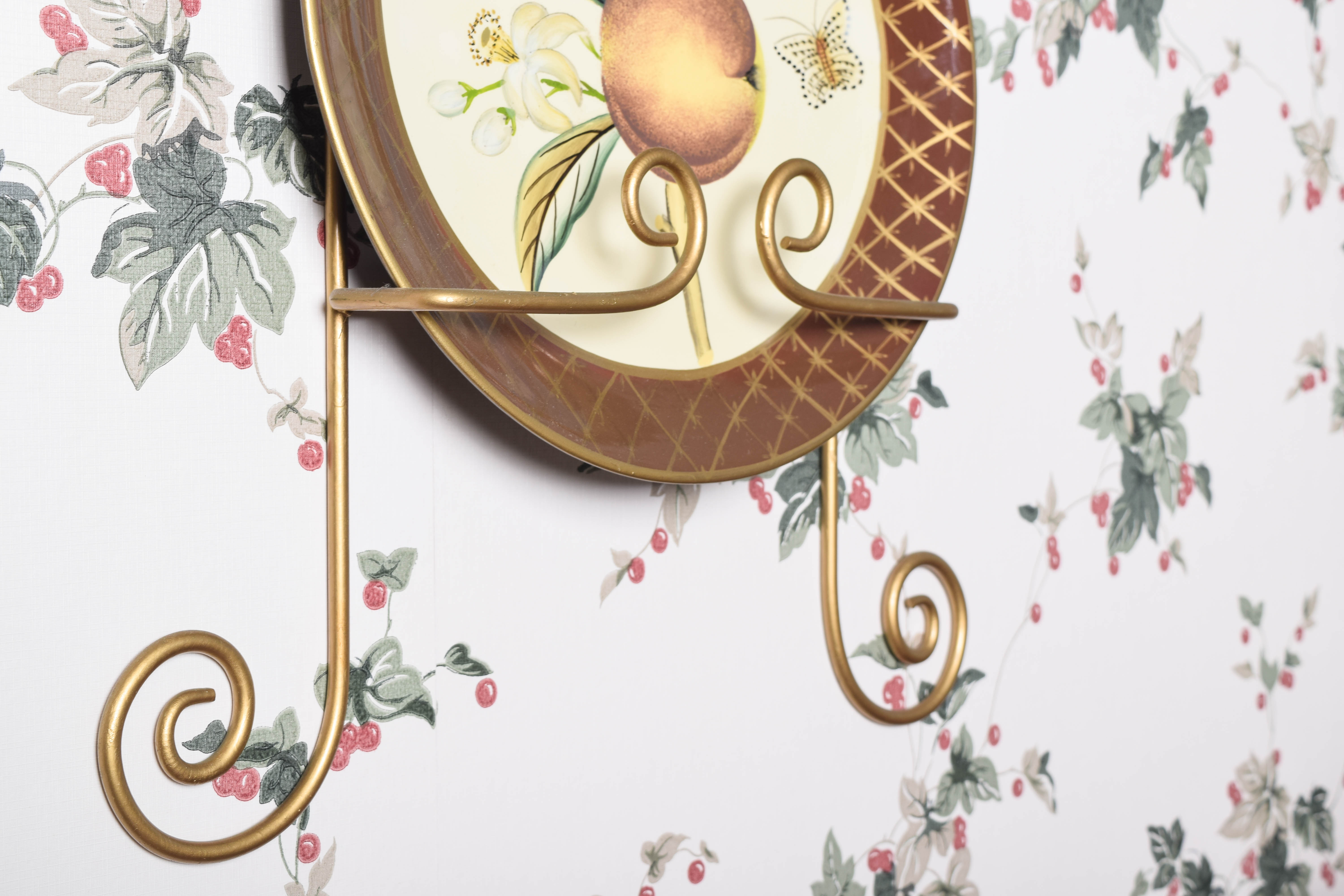 Collection of Raymond Waites Decorative Ceramic Plates and Wall Stands