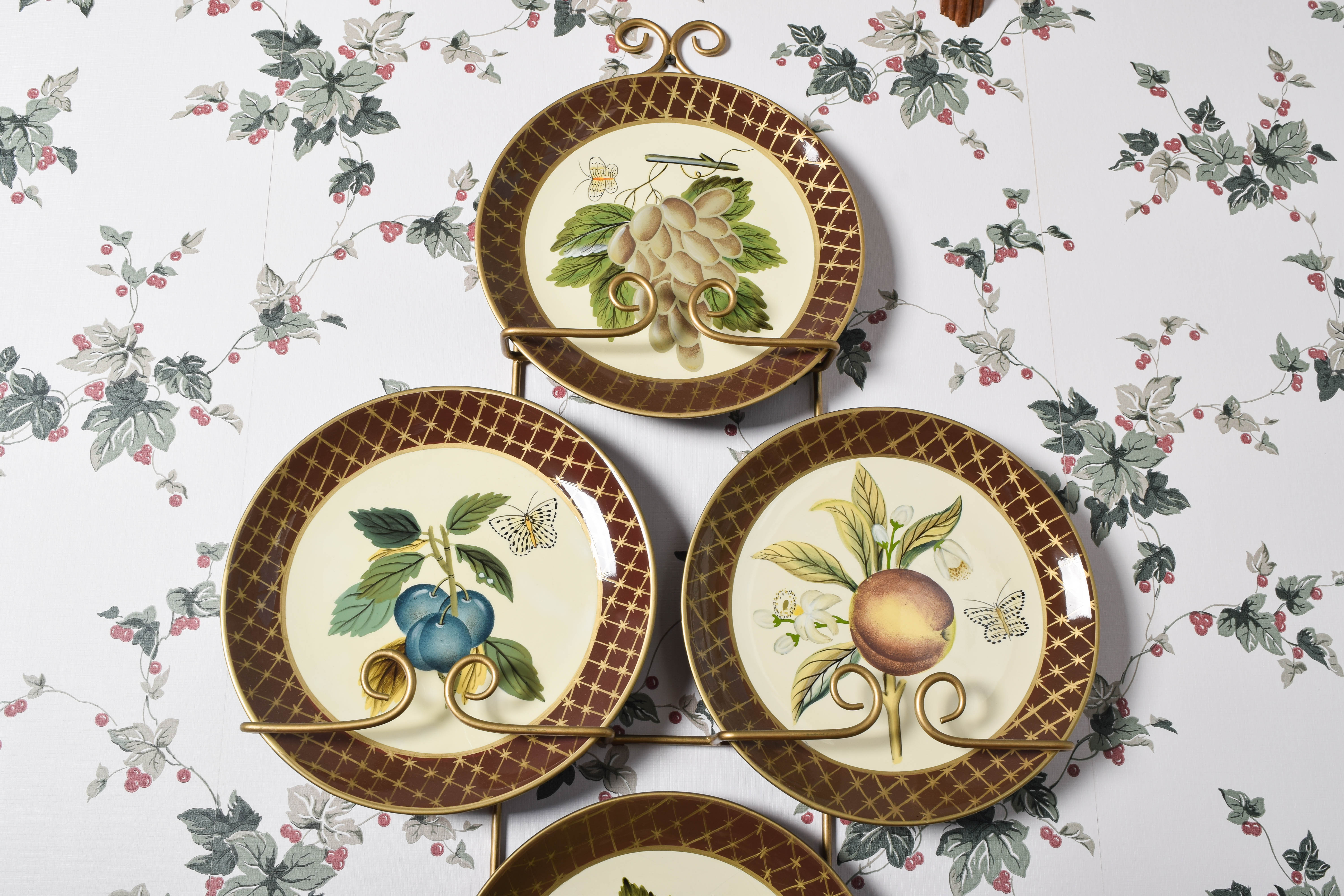 Collection of Raymond Waites Decorative Ceramic Plates and Wall Stands
