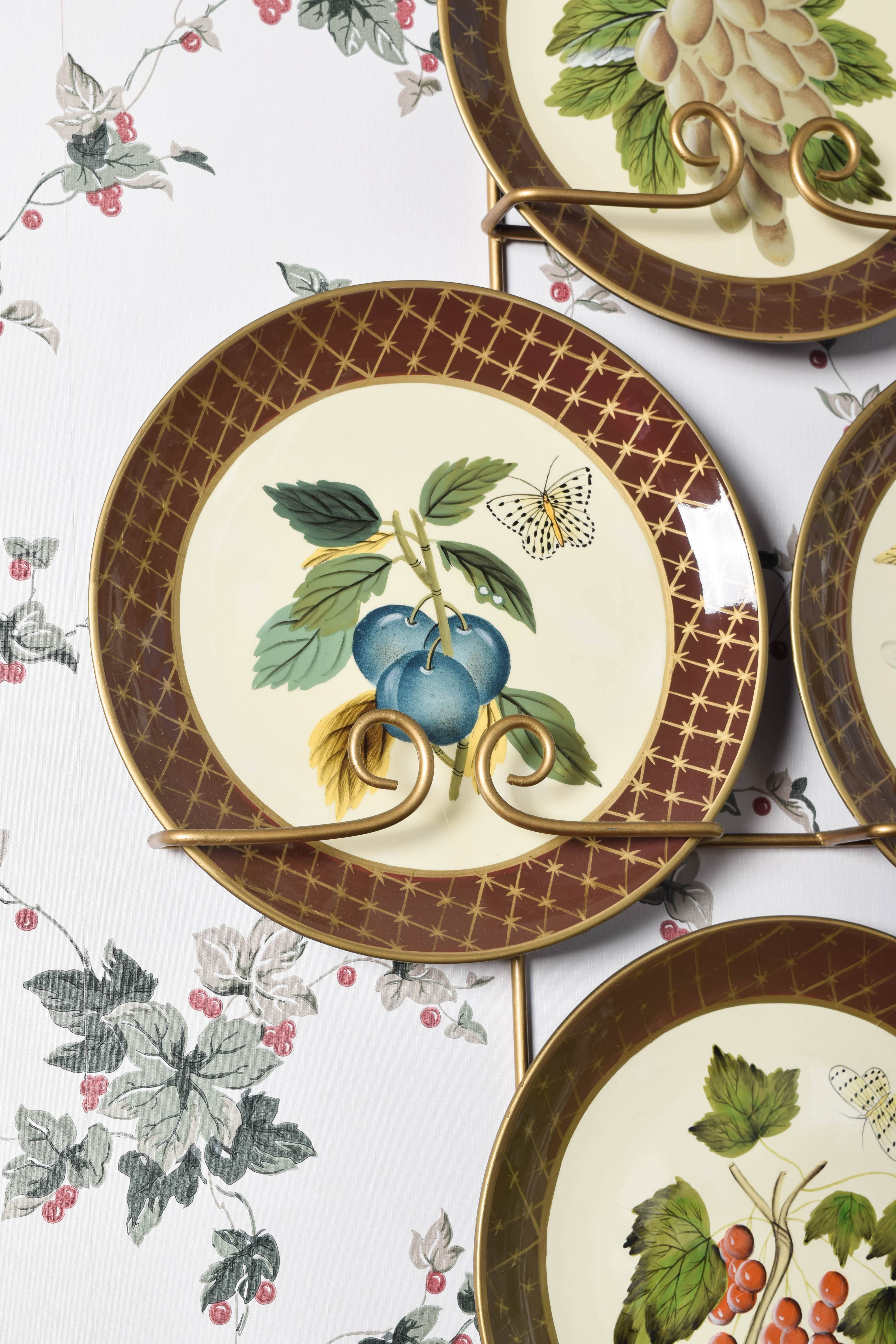 Collection of Raymond Waites Decorative Ceramic Plates and Wall Stands