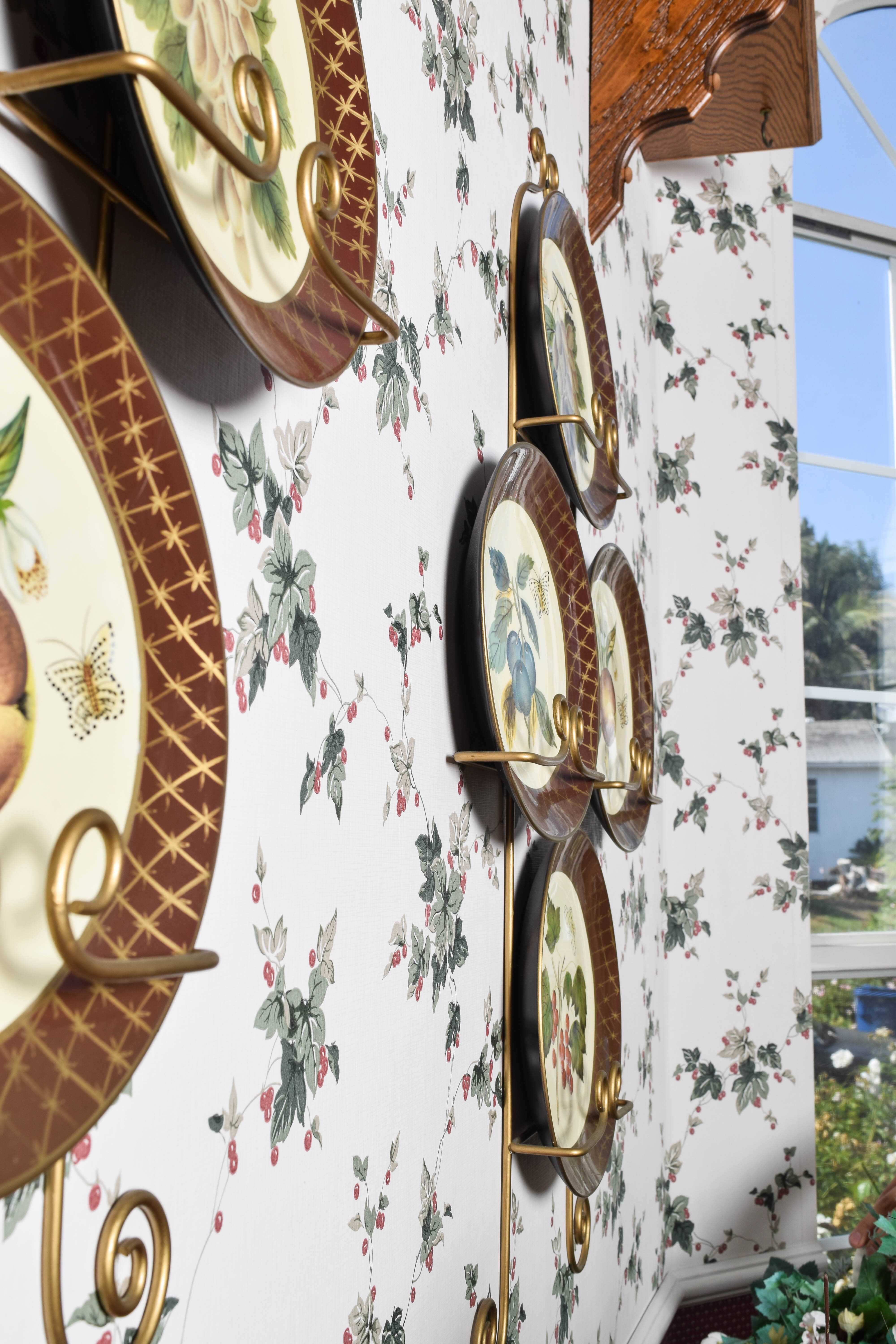 Collection of Raymond Waites Decorative Ceramic Plates and Wall Stands