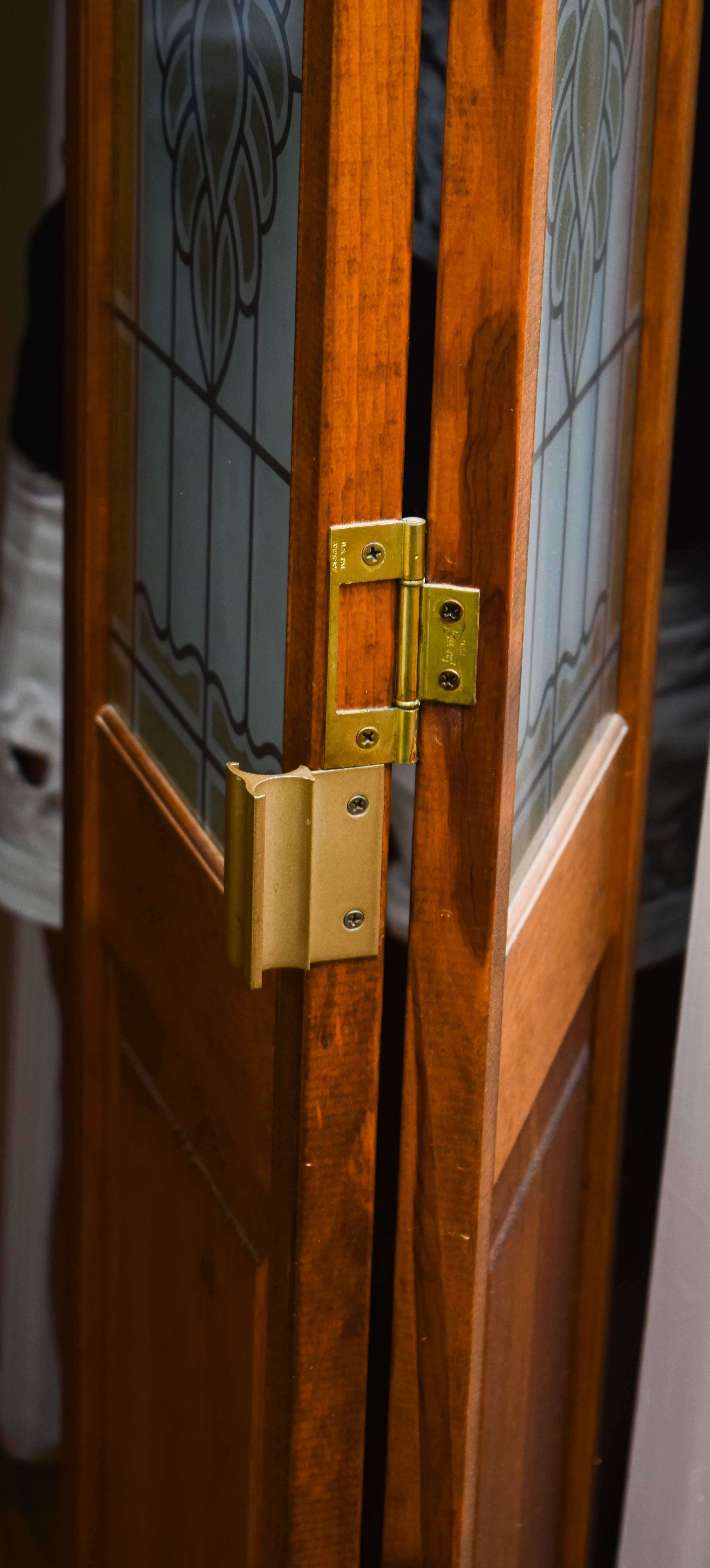 Pair of Wooden Bi-fold Doors with Glass Paneling