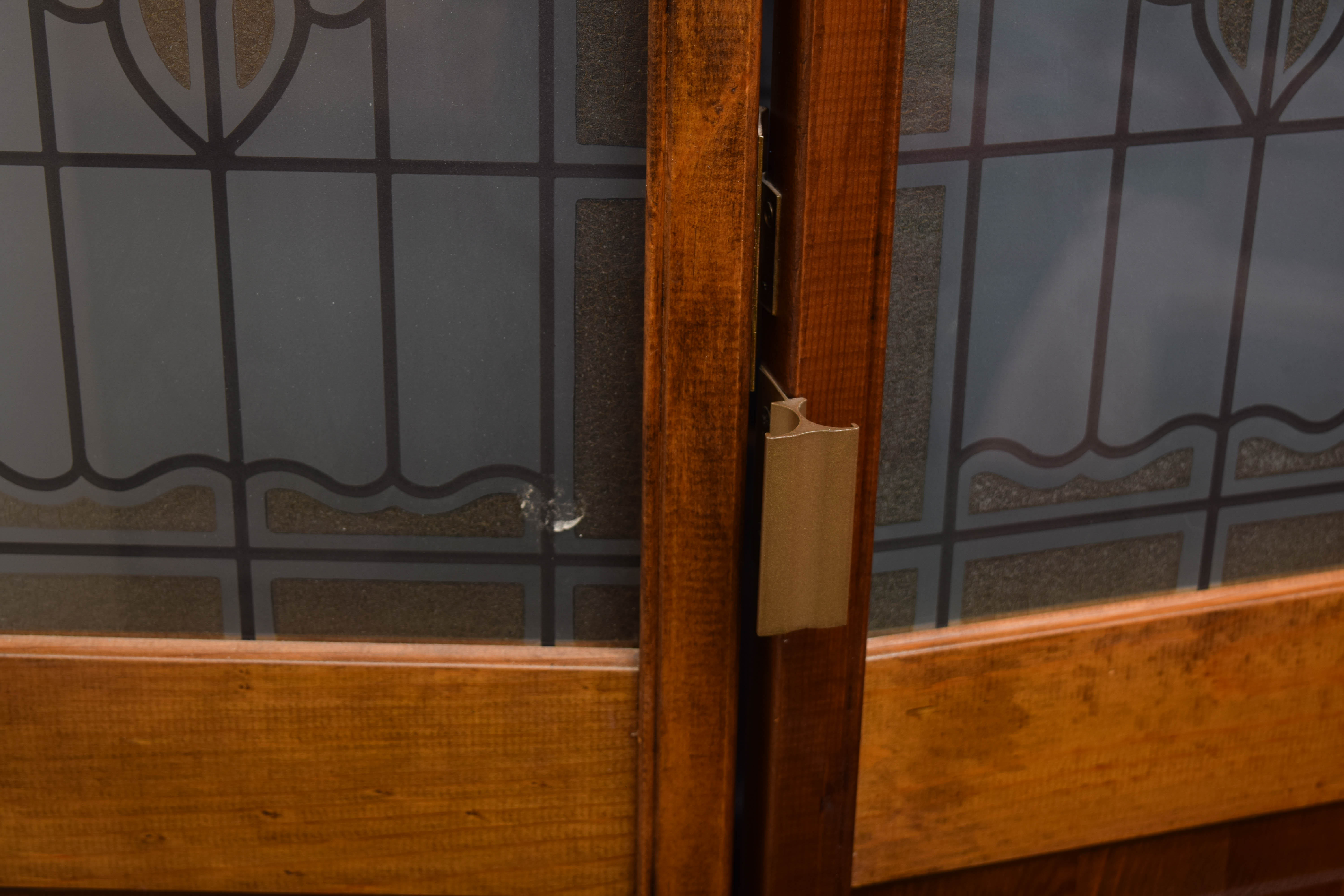 Pair of Wooden Bi-fold Doors with Glass Paneling