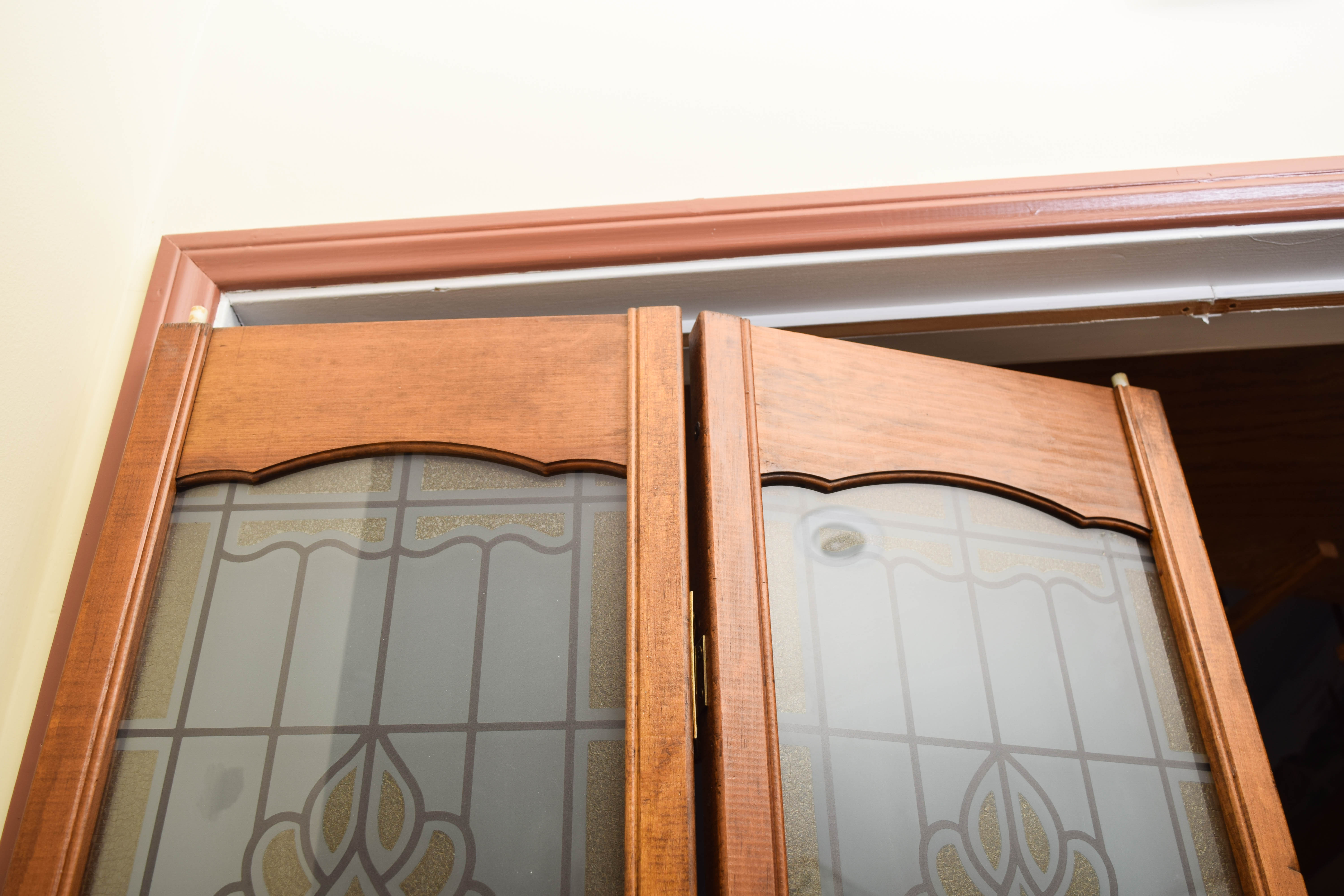 Pair of Wooden Bi-fold Doors with Glass Paneling