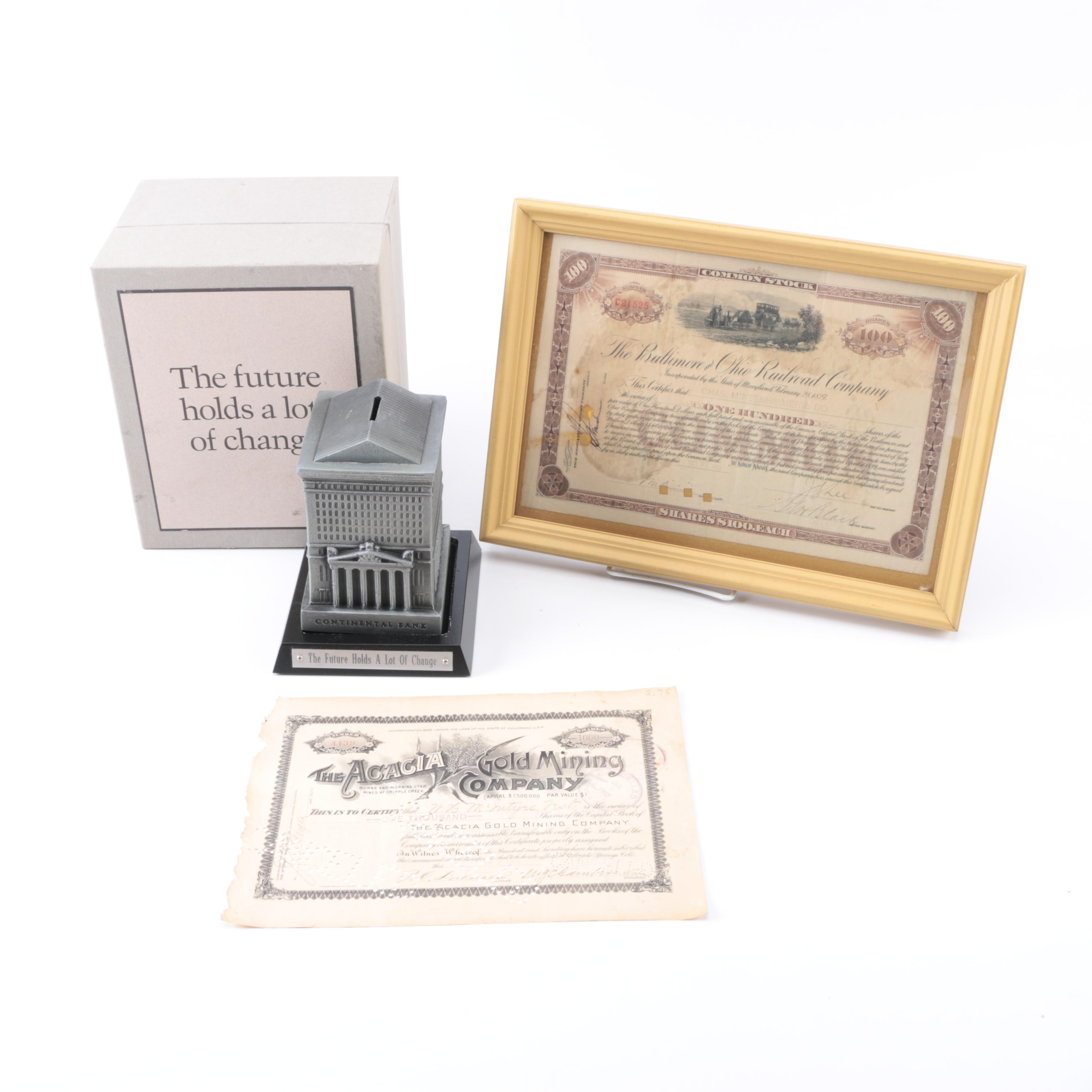 Antique Railroad and Gold Mining Share Certificates and Resin Coin Bank