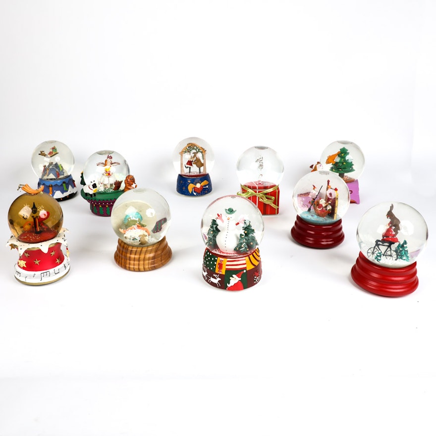 Collection of Neiman Marcus Dept. 56 Christmas Snow Globes