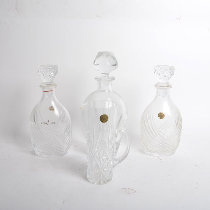 Three Crystal Decanters and One Pitcher