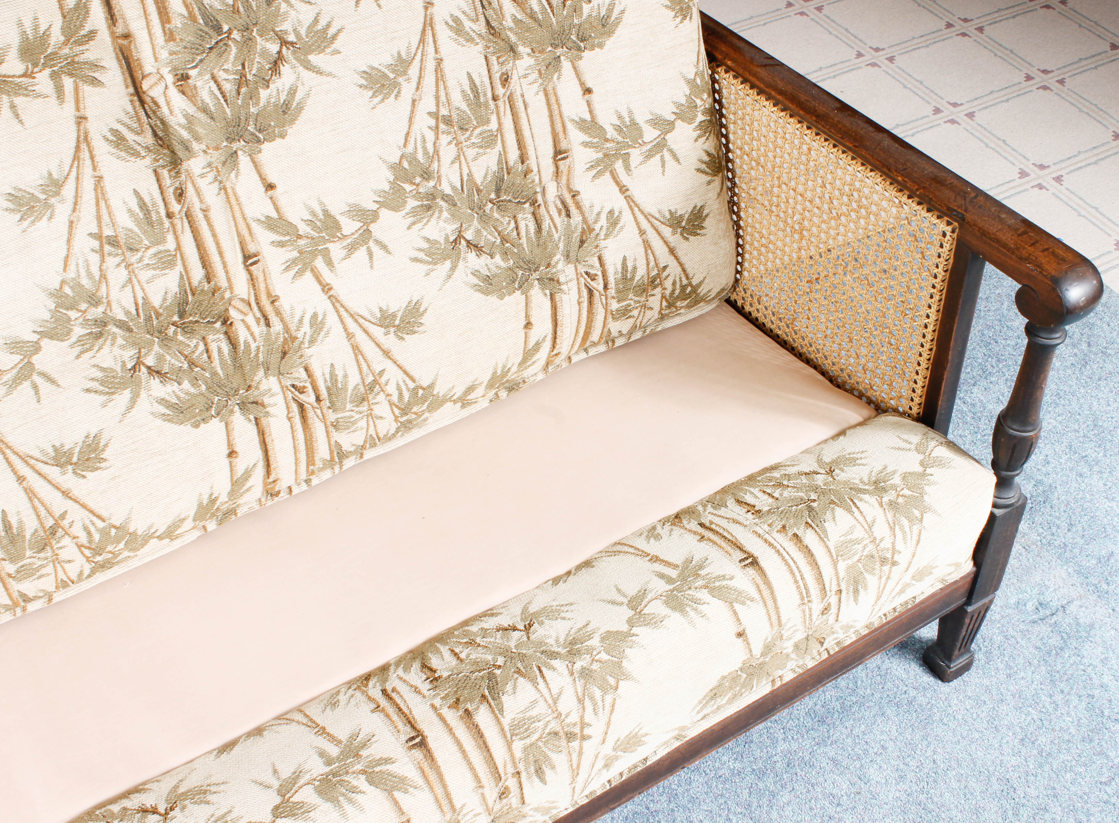 Vintage Plantation-Style Caned and Upholstered Sofa
