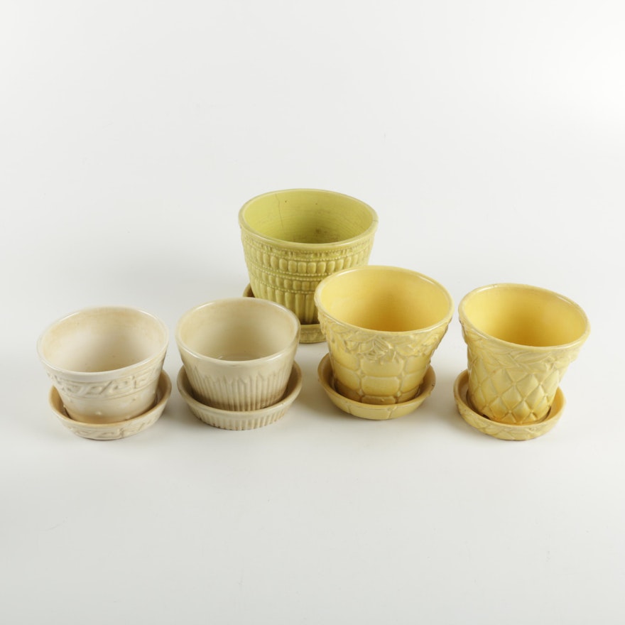 Five McCoy Yellow Ceramic Planters