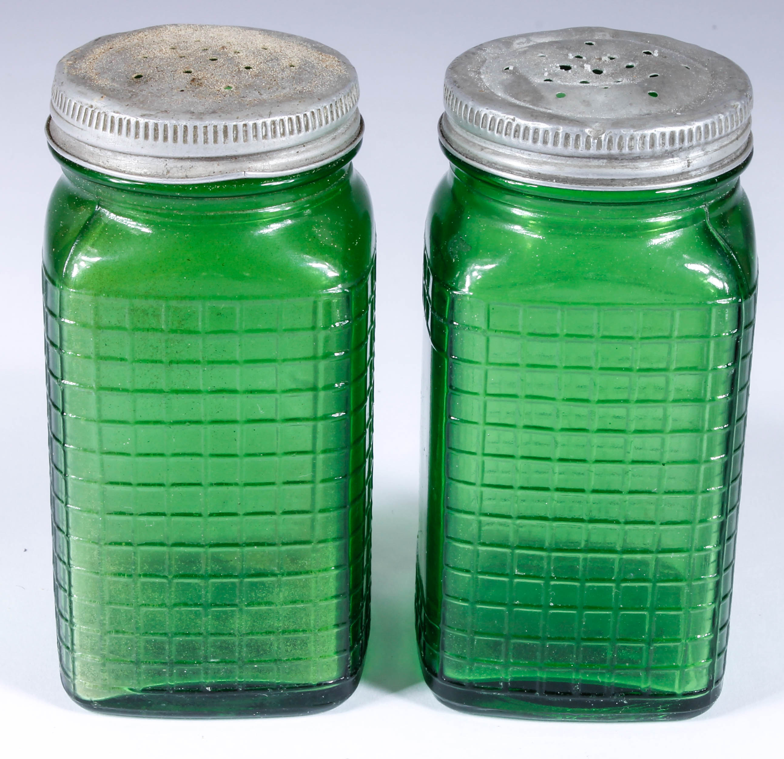 Assortment of Salt and Pepper Shakers with Salt Cellars