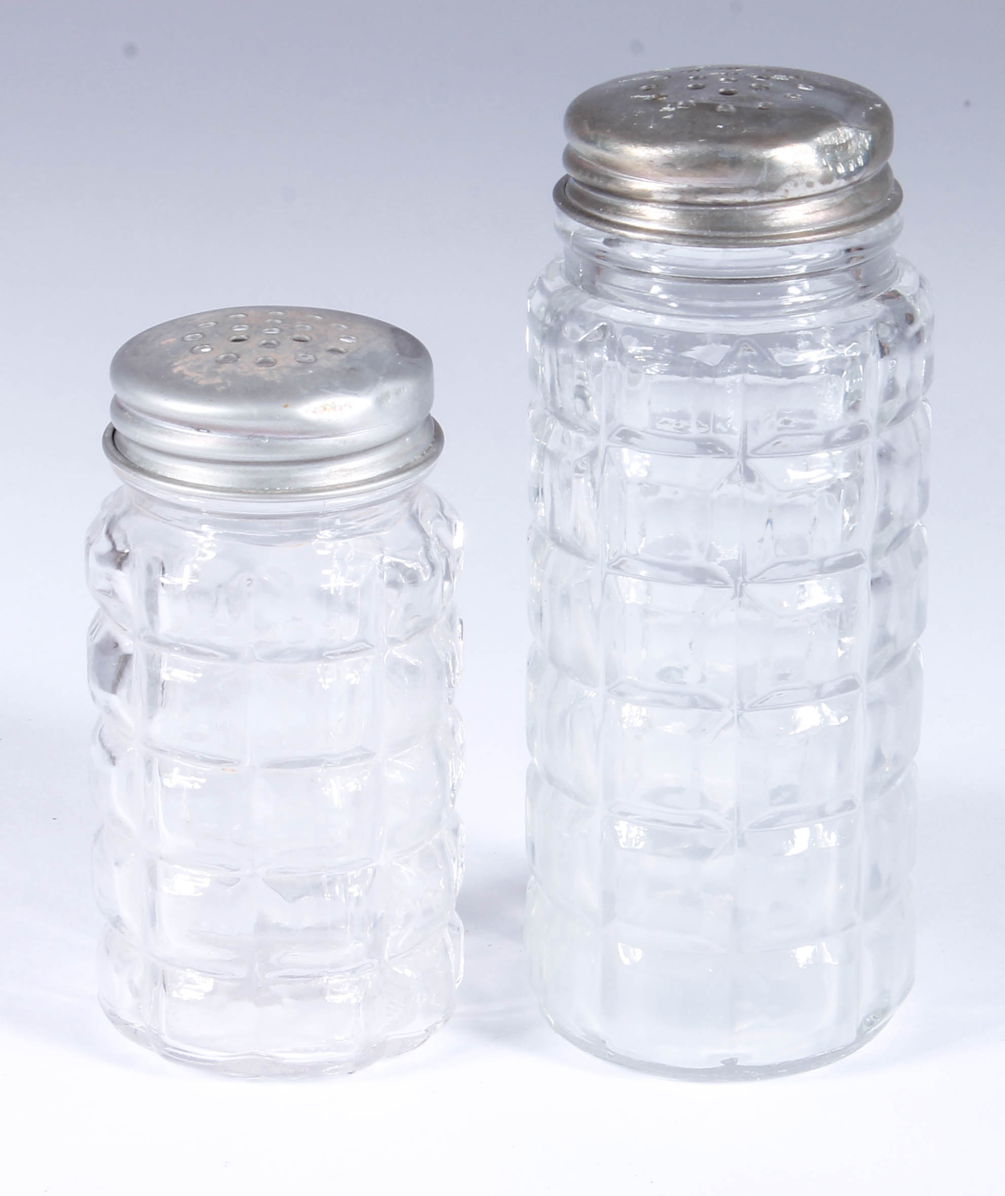 Assortment of Salt and Pepper Shakers with Salt Cellars