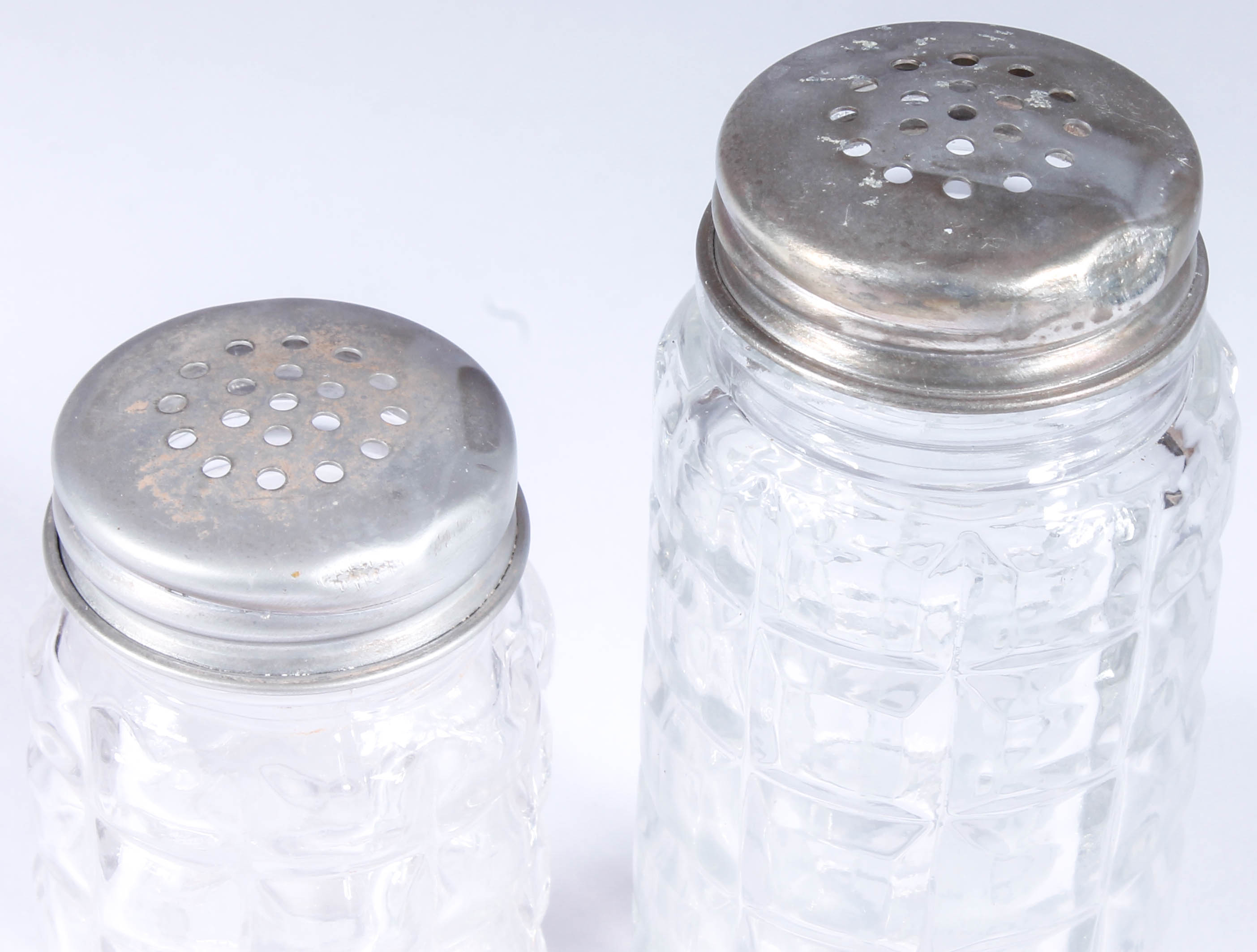 Assortment of Salt and Pepper Shakers with Salt Cellars