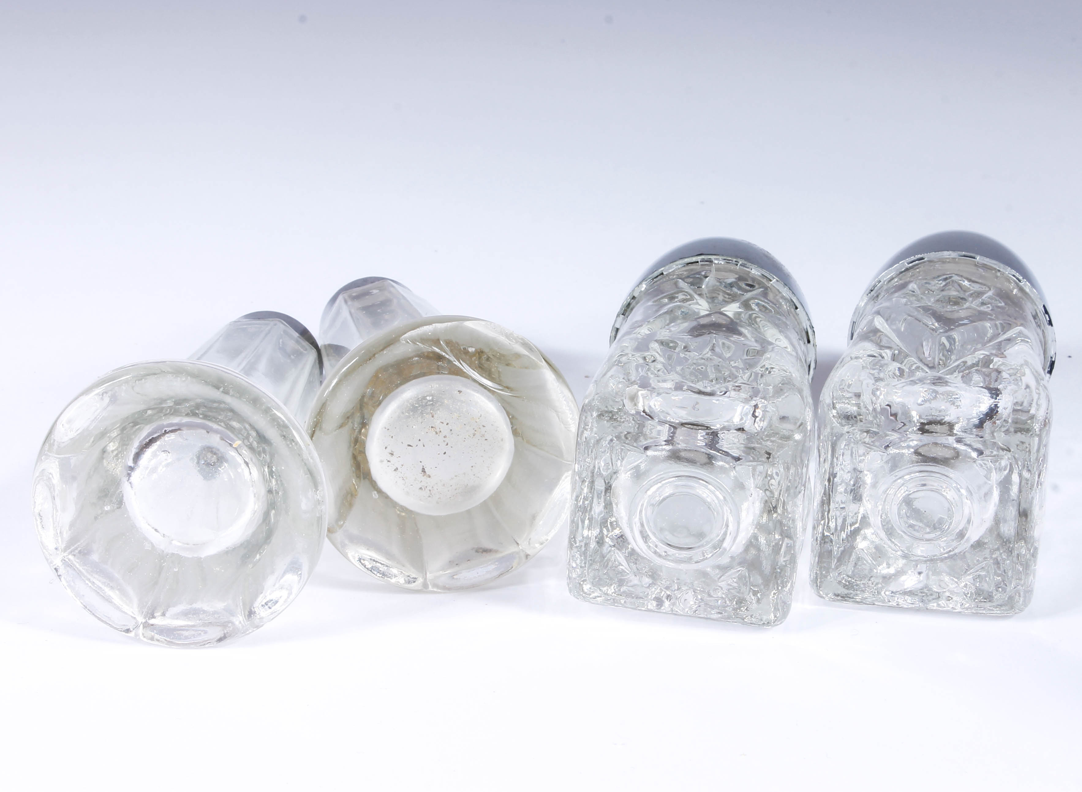 Assortment of Salt and Pepper Shakers with Salt Cellars